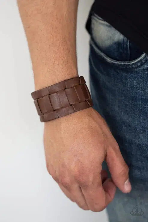 Plainly Plaited Brown Leather Urban Bracelet - Paparazzi Accessories- on model - CarasShop.com - $5 Jewelry by Cara Jewels