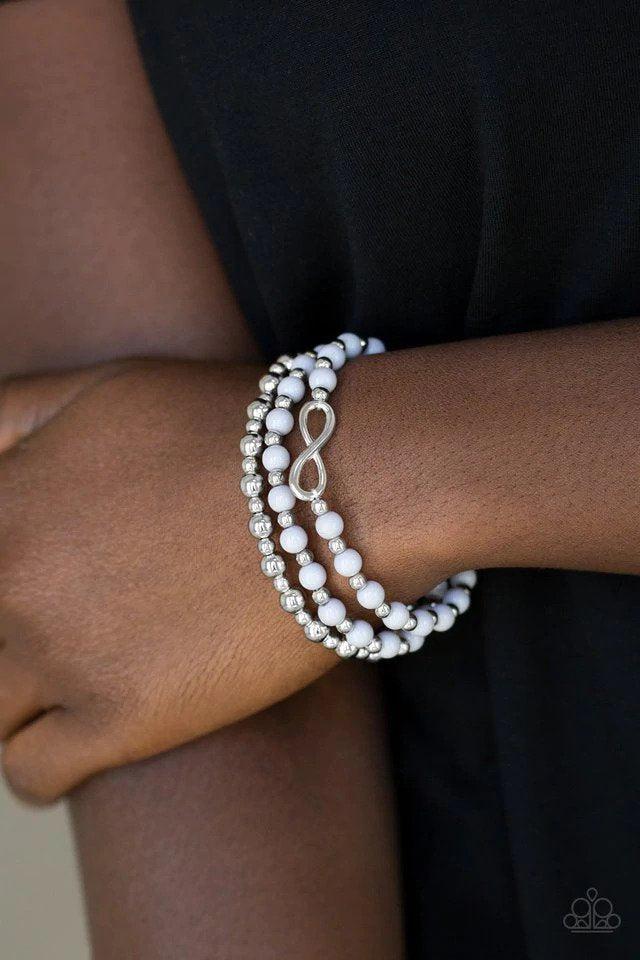 Immeasurably Infinite Silver Bracelet - Paparazzi Accessories- on model - CarasShop.com - $5 Jewelry by Cara Jewels