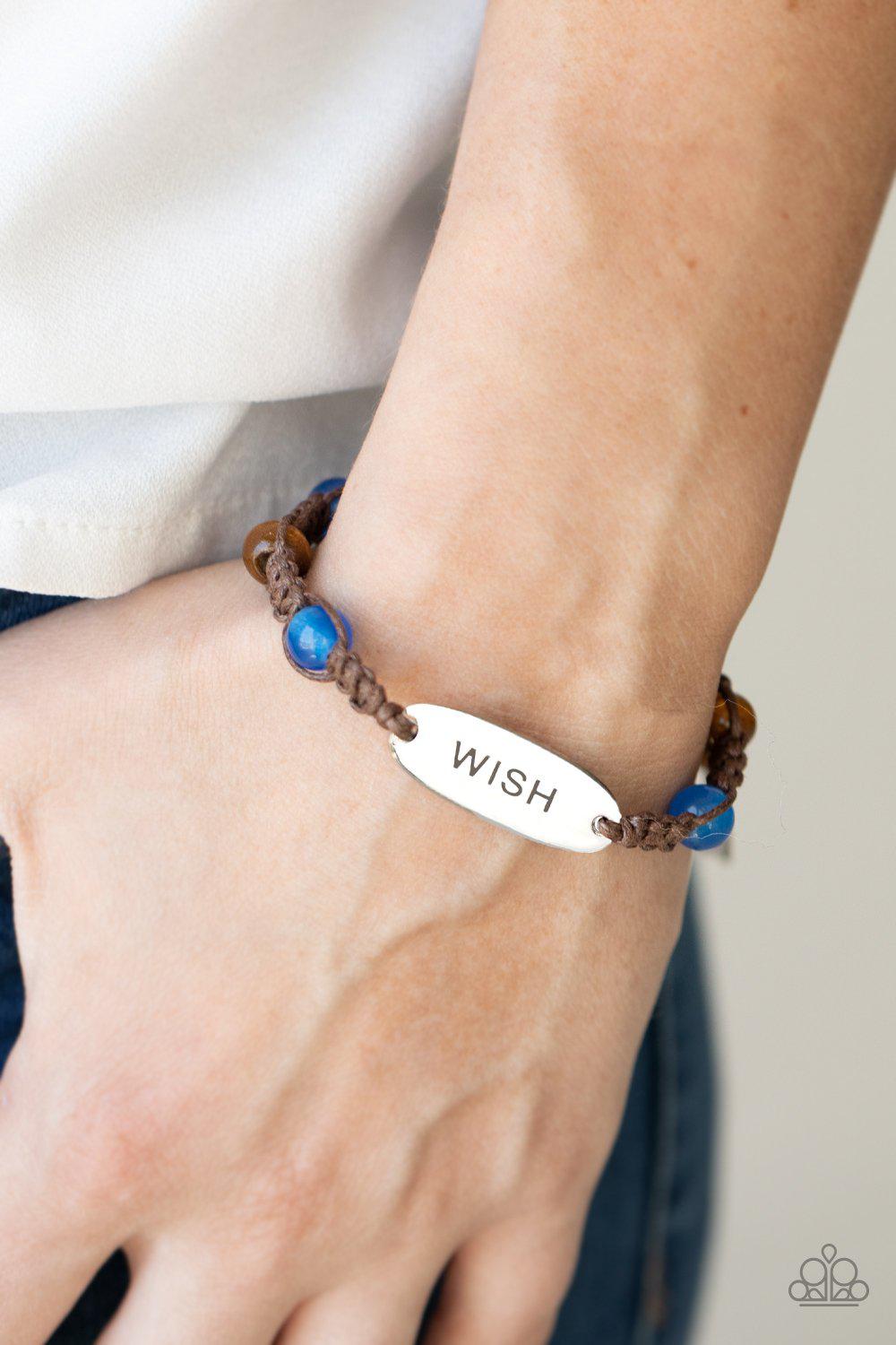 WISH This Way Blue Inspirational Urban Knot Bracelet - Paparazzi Accessories- model - CarasShop.com - $5 Jewelry by Cara Jewels