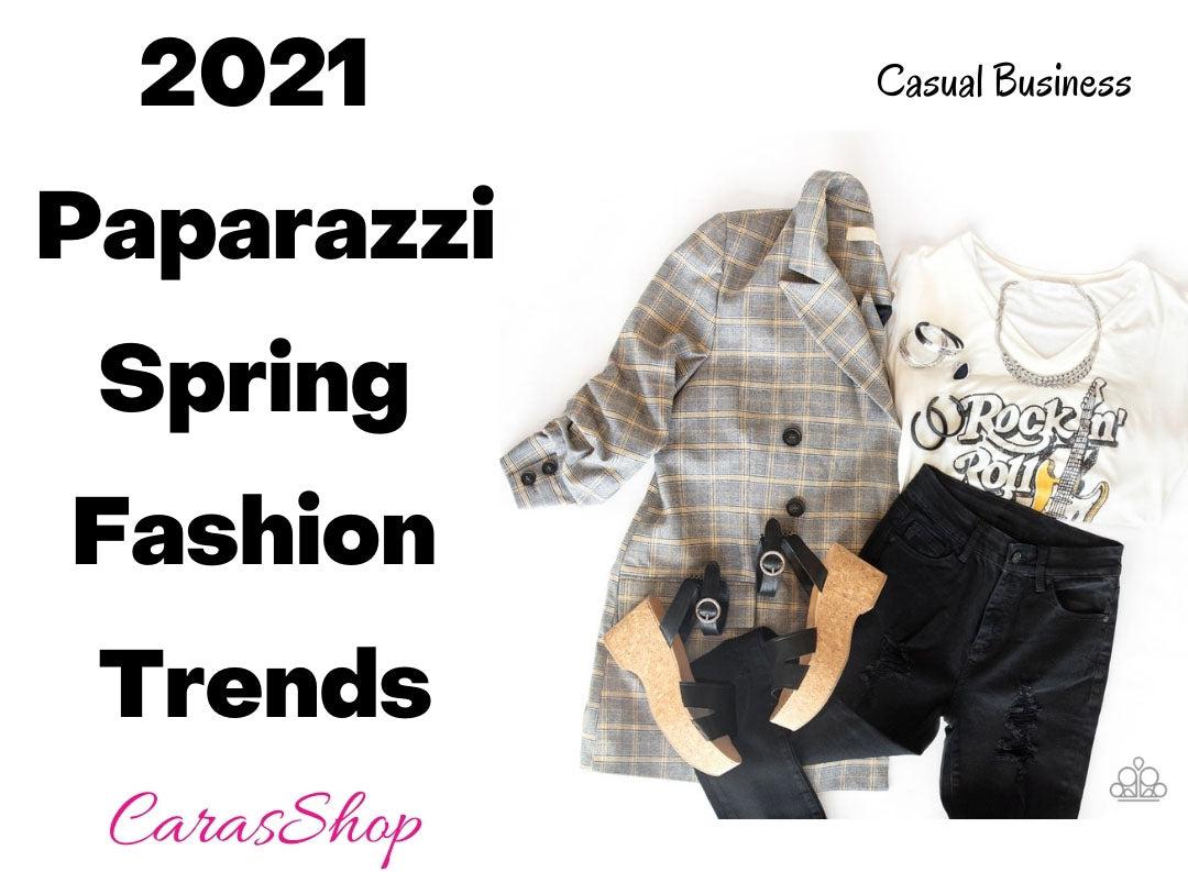 A grey sport coat, cork wedge sandals, black pants and a a graphic tee represent the elements of the Paparazzi Accessories Casual Business Fashion trend.