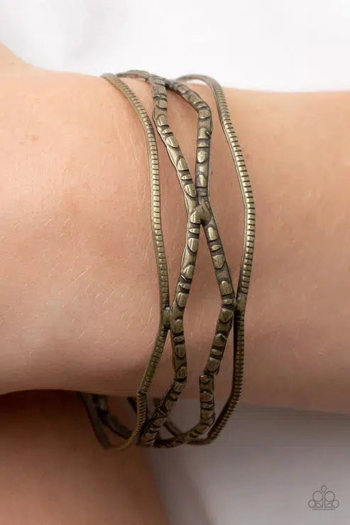 A Narrow ESCAPADE Brass Bracelet - Paparazzi Accessories-on model - CarasShop.com - $5 Jewelry by Cara Jewels