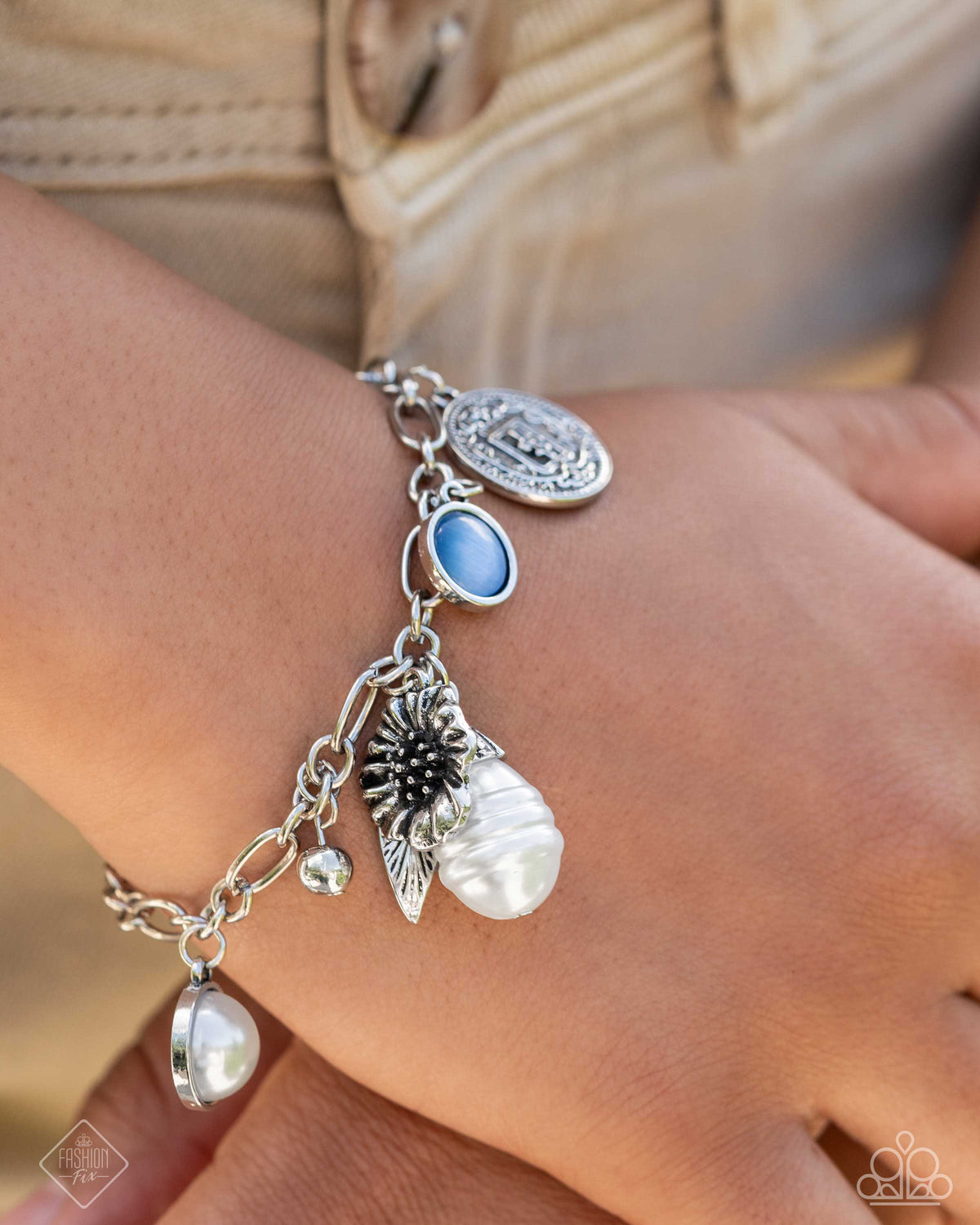 Enduring Energy Blue Charm Bracelet - Paparazzi Accessories-on model - CarasShop.com - $5 Jewelry by Cara Jewels