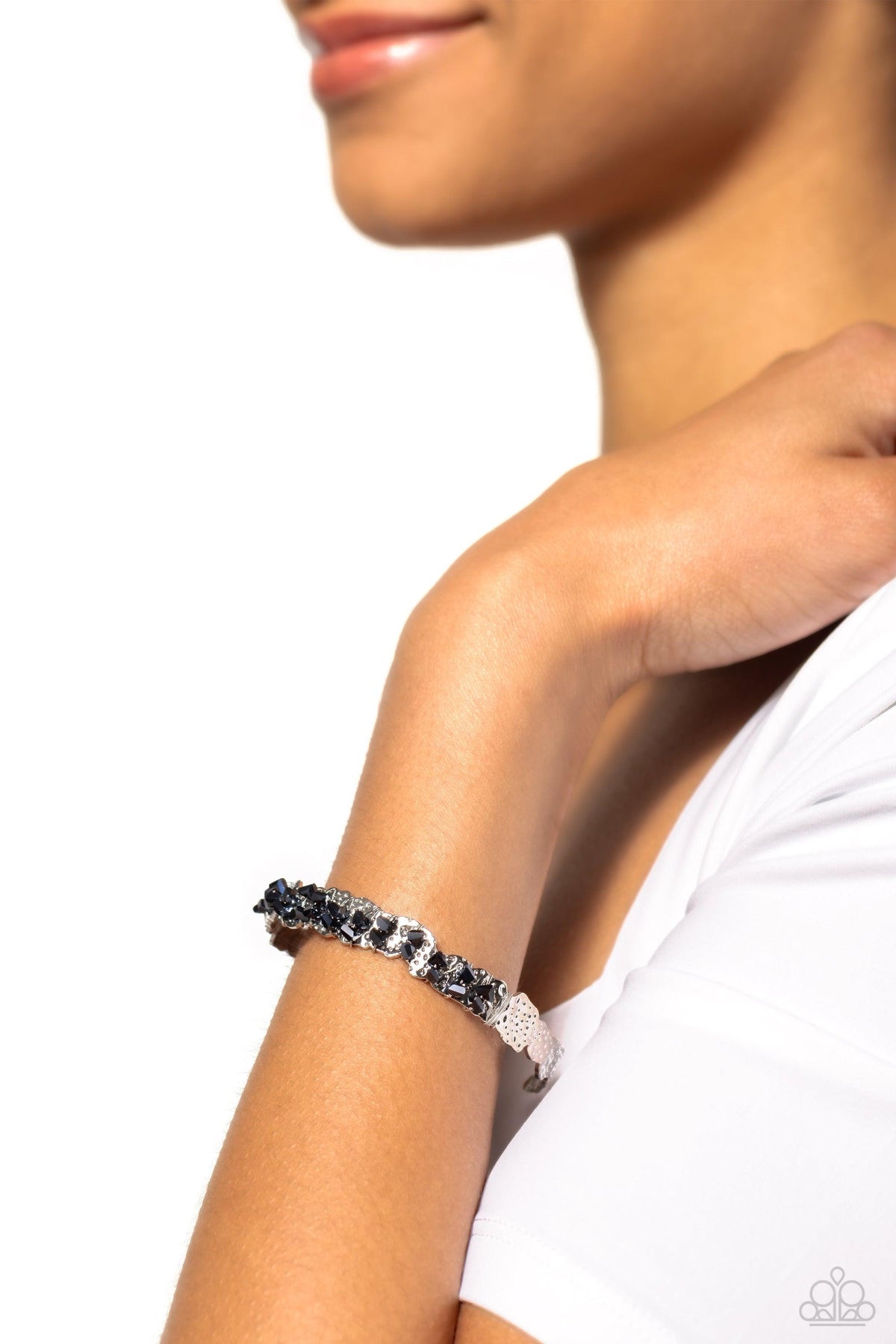 Enticingly Icy Blue Rhinestone Cuff Bracelet - Paparazzi Accessories-on model - CarasShop.com - $5 Jewelry by Cara Jewels