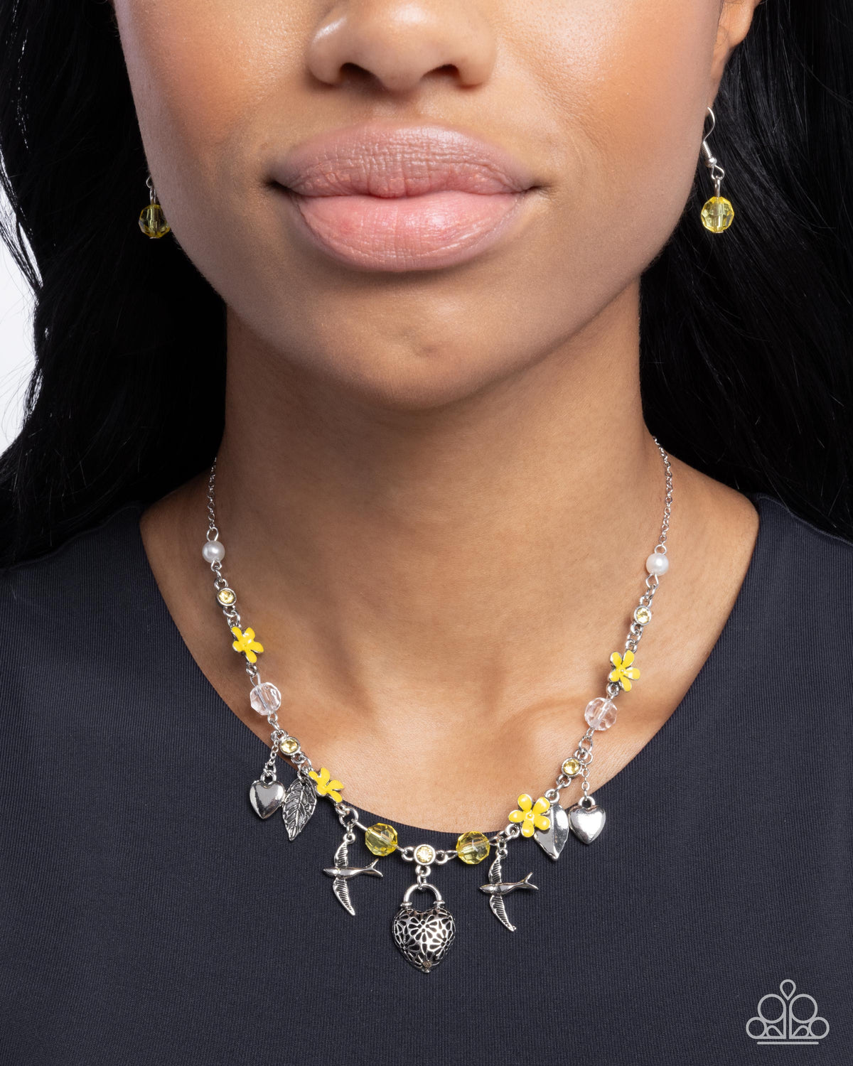 Flight of the Sparrow Yellow Flower and Silver Charm Necklace - Paparazzi Accessories-on model - CarasShop.com - $5 Jewelry by Cara Jewels