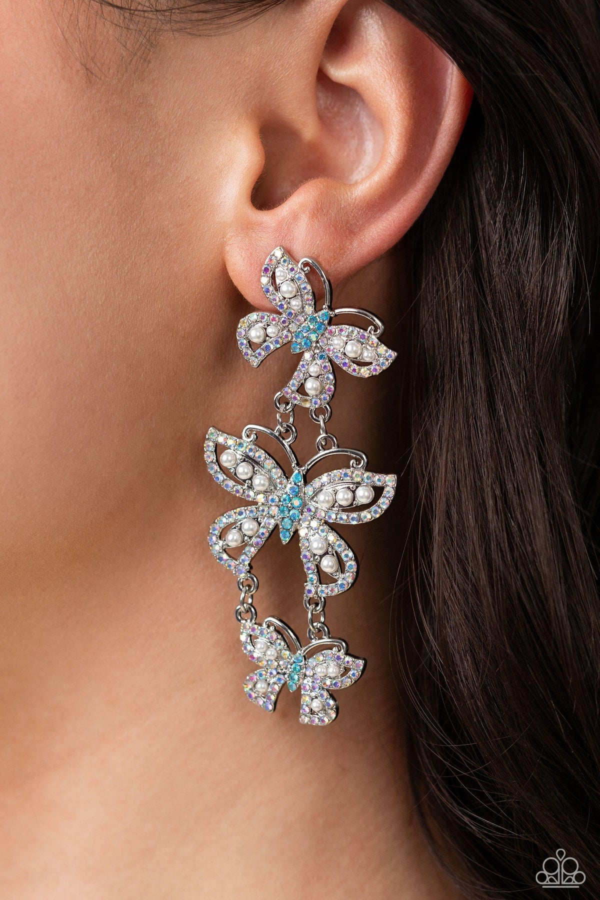 Fluttering Finale Multi Iridescent Rhinestone Butterfly Earrings - Paparazzi Accessories-on model - CarasShop.com - $5 Jewelry by Cara Jewels