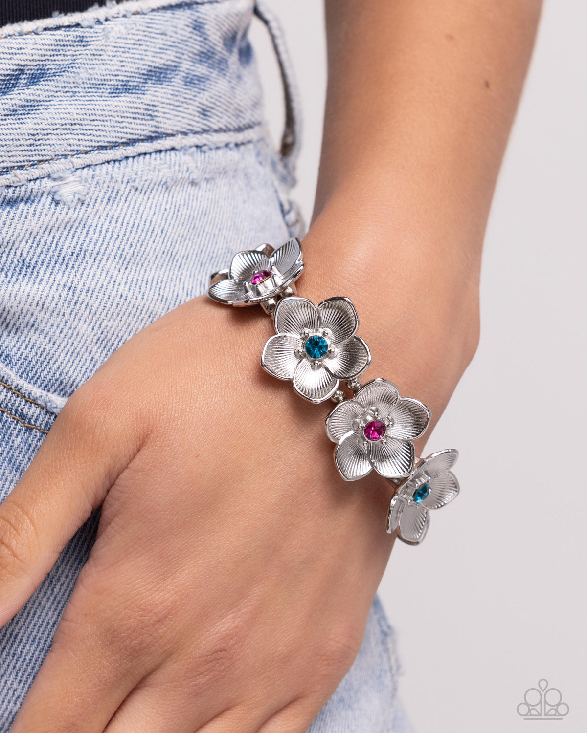 General Grandeur Blue Gem &amp; Silver Flower Bracelet - Paparazzi Accessories-on model - CarasShop.com - $5 Jewelry by Cara Jewels
