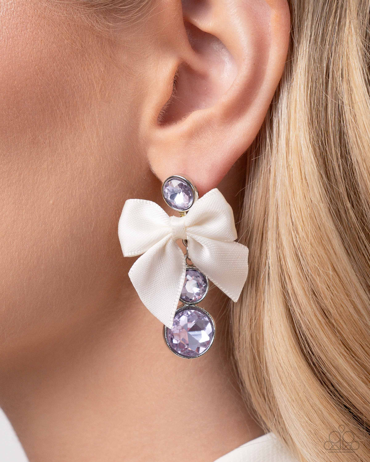 Genteel Glam Purple Rhinestone and Bow Earrings - Paparazzi Accessories-on model - CarasShop.com - $5 Jewelry by Cara Jewels