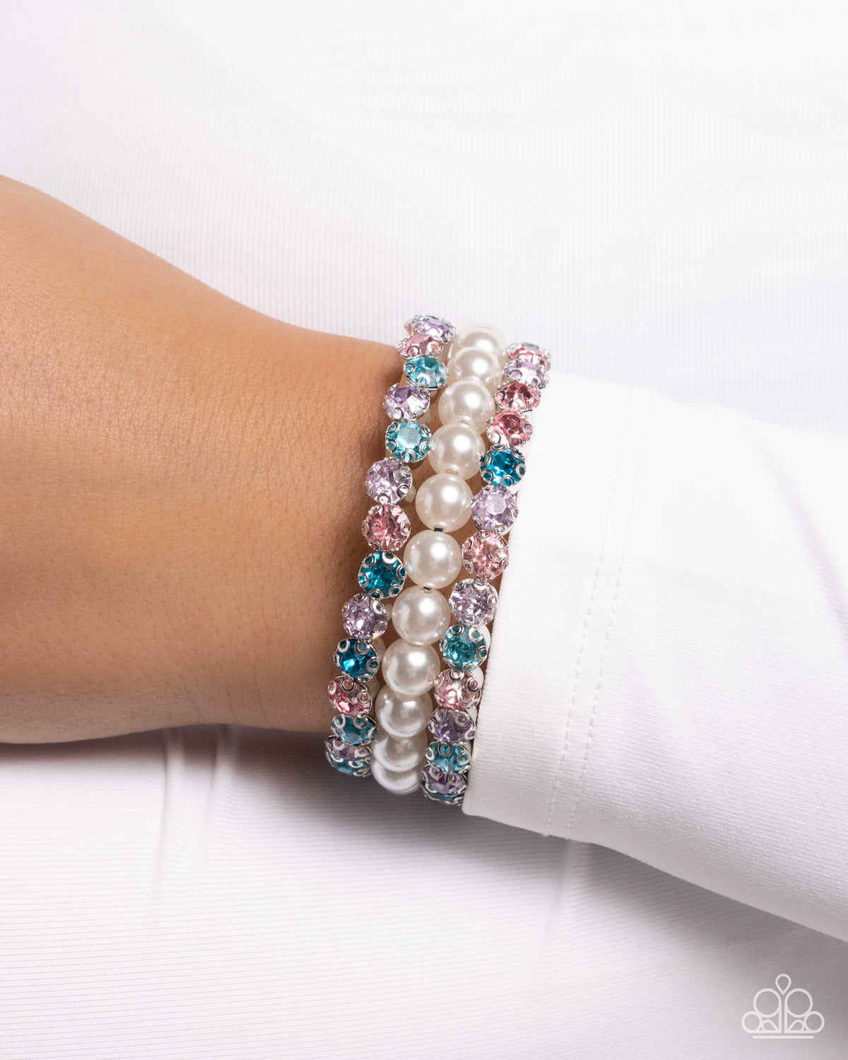 Grandiose Glitz Multi Rhinestone &amp; Pearl Coil Bracelet - Paparazzi Accessories-on model - CarasShop.com - $5 Jewelry by Cara Jewels