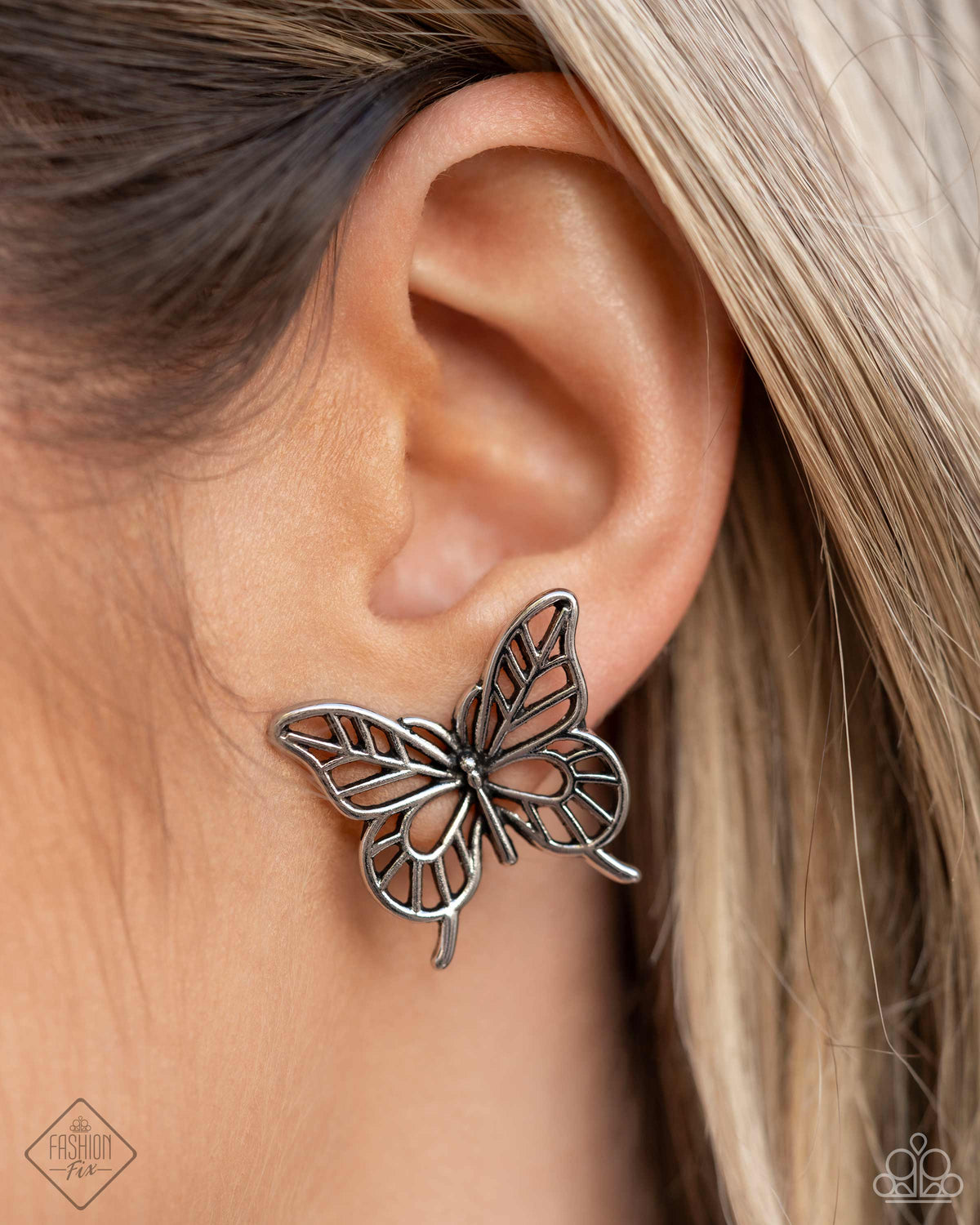 High and FLIGHTY Silver Butterfly Earrings - Paparazzi Accessories-on model - CarasShop.com - $5 Jewelry by Cara Jewels