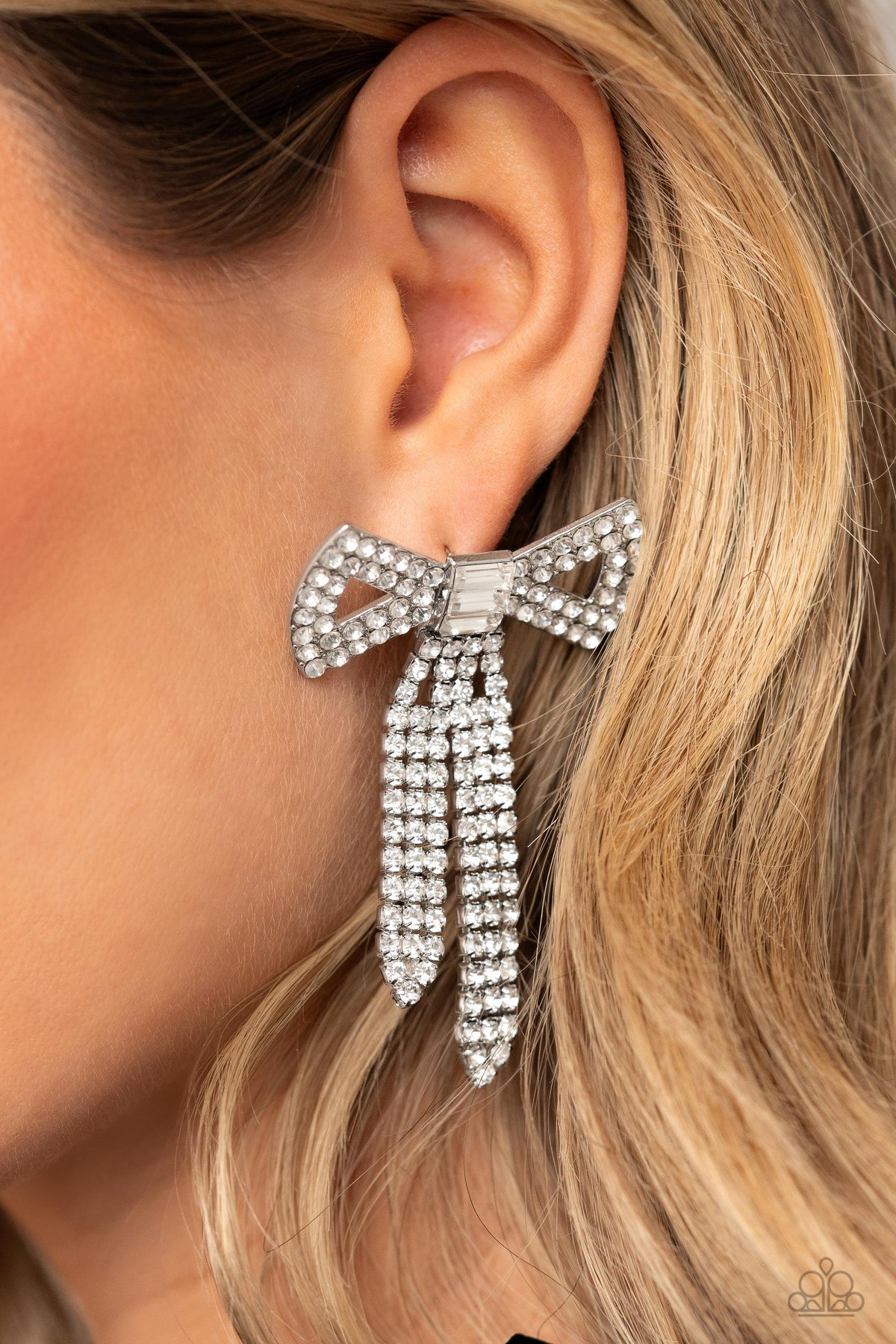 Just BOW With It White Rhinestone Earrings - Paparazzi Accessories-on model - CarasShop.com - $5 Jewelry by Cara Jewels