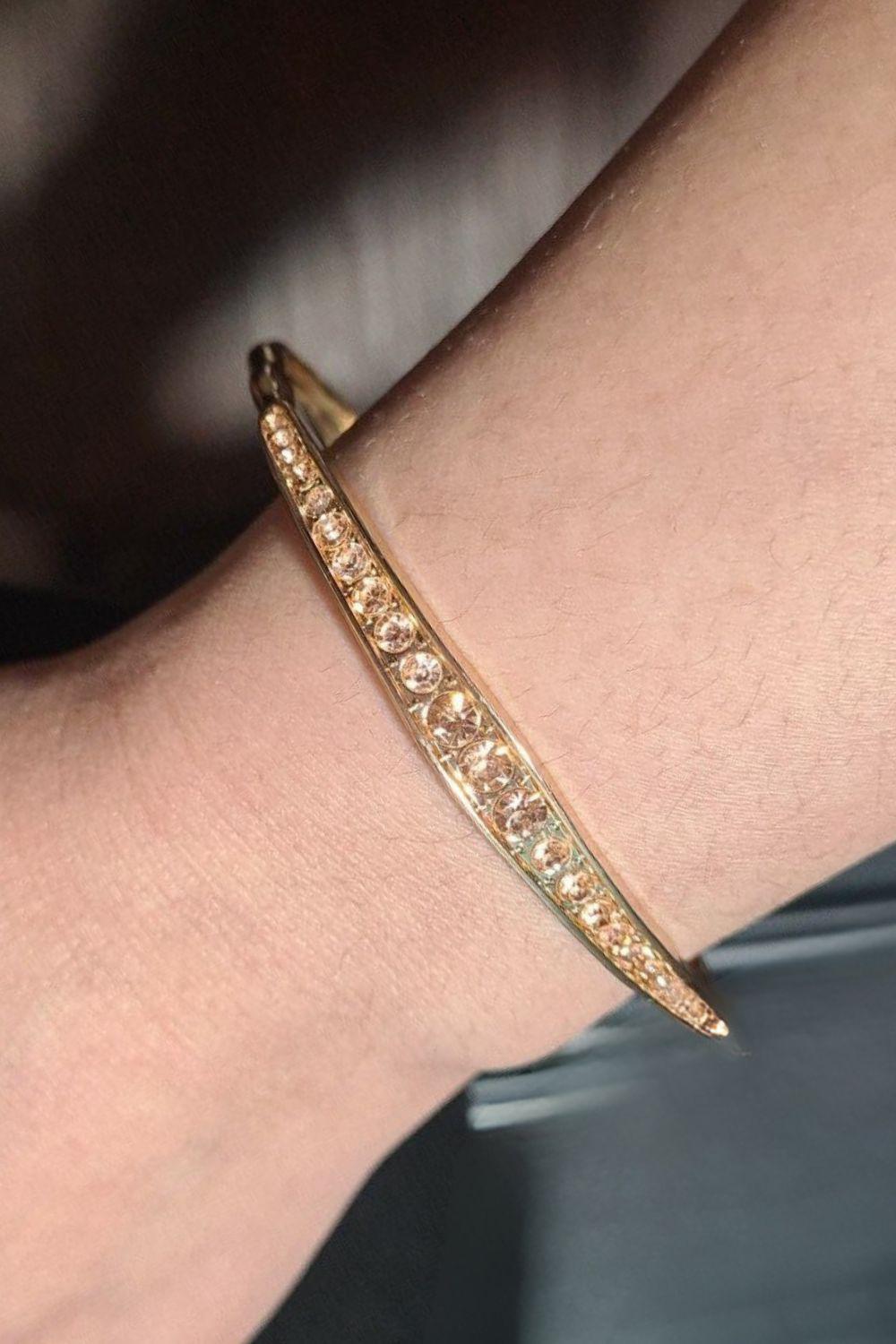 Just SPARKLE and Wave Gold Bracelet - Paparazzi Accessories- on model - CarasShop.com - $5 Jewelry by Cara Jewels