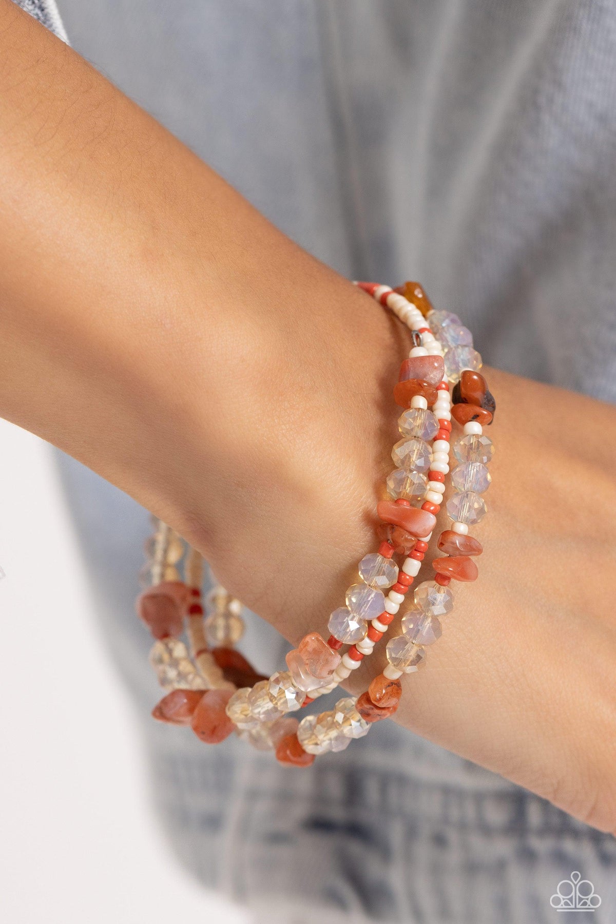 Notoriously Nuanced Orange Seed Bead &amp; Stone Coil Bracelet - Paparazzi Accessories-on model - CarasShop.com - $5 Jewelry by Cara Jewels