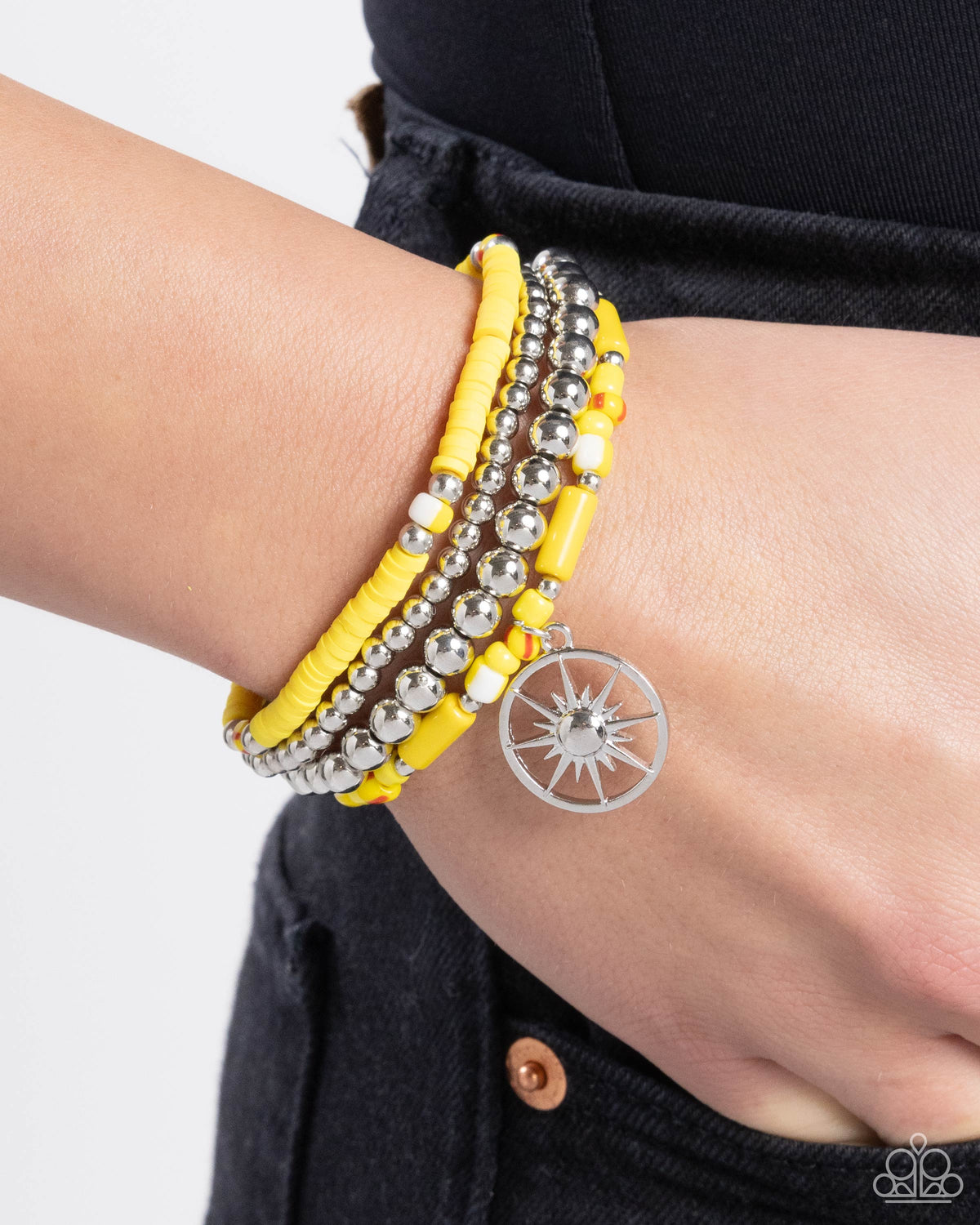 Nuanced Navigator Yellow &amp; Silver Sunburst Charm Bracelet Set - Paparazzi Accessories-on model - CarasShop.com - $5 Jewelry by Cara Jewels