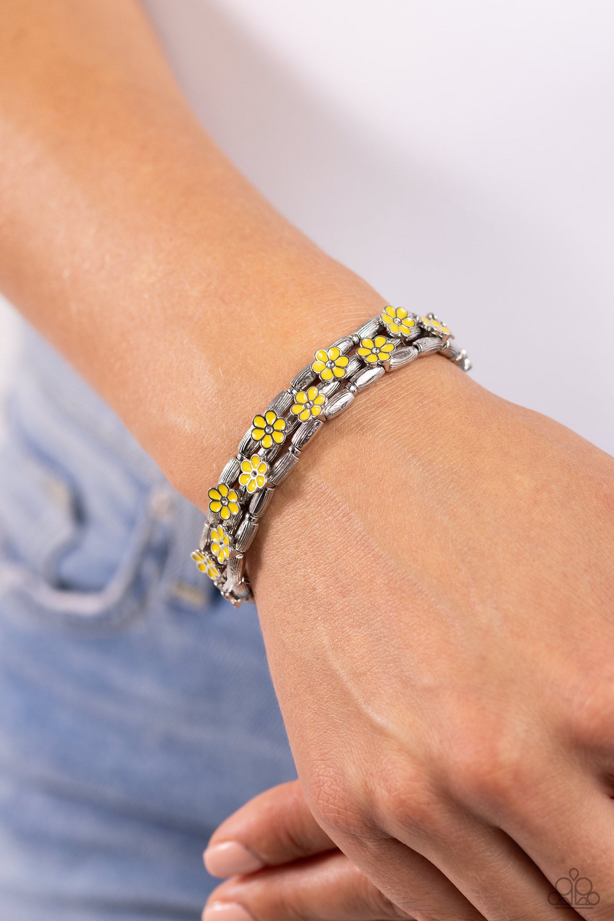 Scattered Springtime Yellow Flower Bracelet - Paparazzi Accessories-on model - CarasShop.com - $5 Jewelry by Cara Jewels