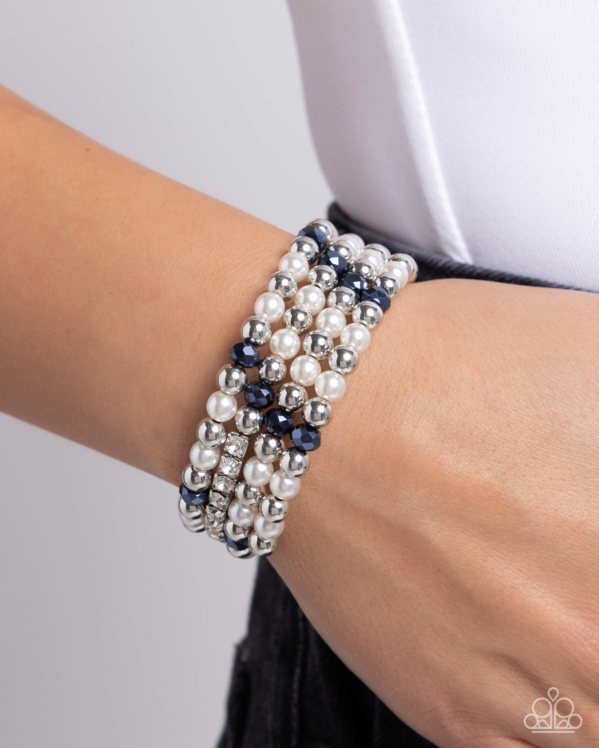 Serene Stack Blue, White &amp; Silver Coil Bracelet - Paparazzi Accessories-on model - CarasShop.com - $5 Jewelry by Cara Jewels