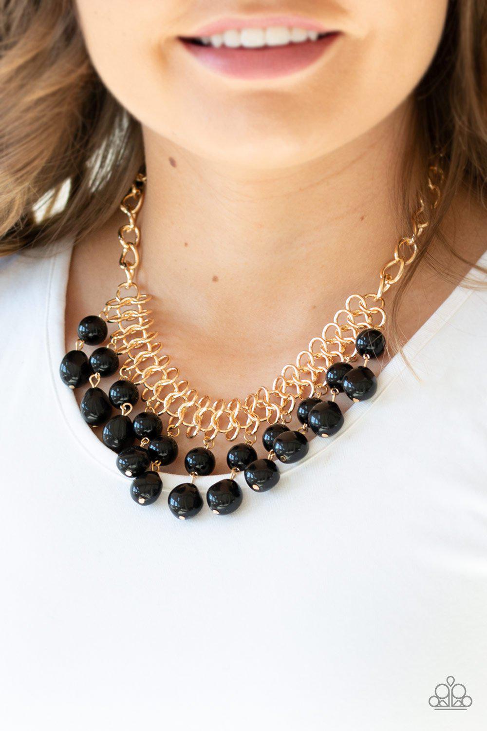 5th Avenue Fleek Black and Gold Necklace - Paparazzi Accessories - model -CarasShop.com - $5 Jewelry by Cara Jewels