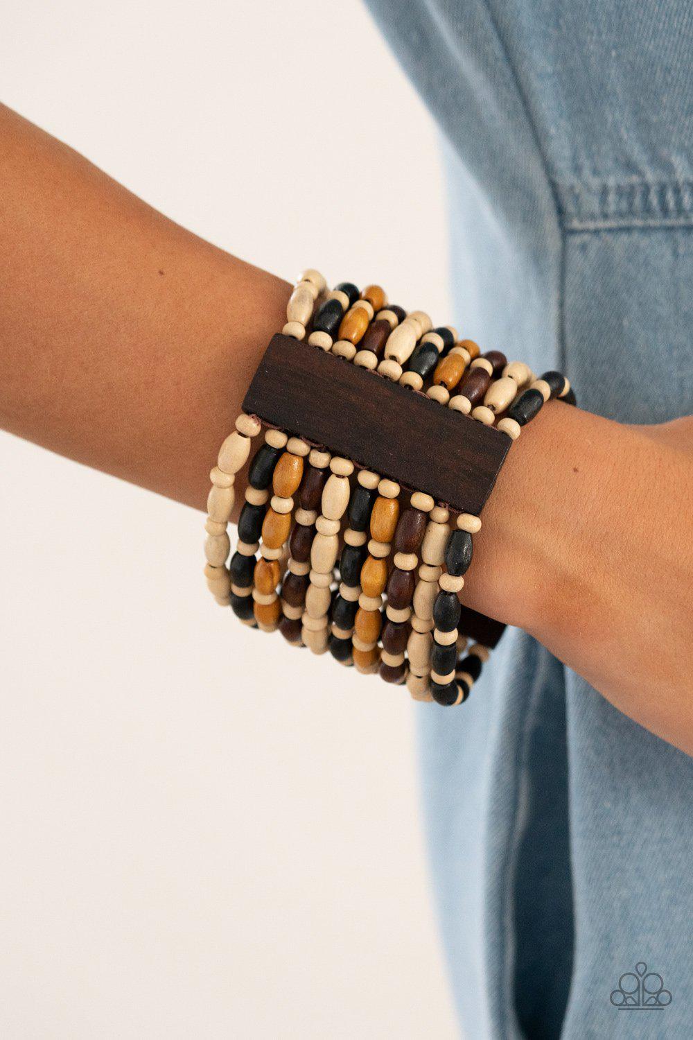 Cayman Carnival Multi Black, Brown and White Wood Bracelet - Paparazzi Accessories- model - CarasShop.com - $5 Jewelry by Cara Jewels