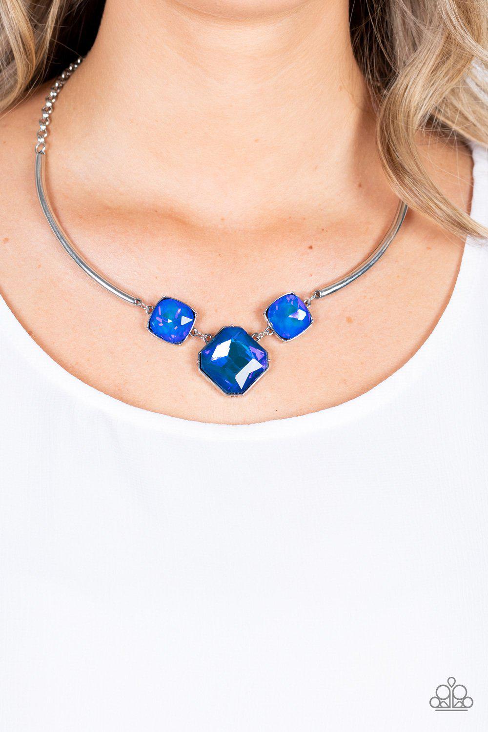 Divine IRIDESCENCE Blue Rhinestone Necklace - Paparazzi Accessories Life of the Party Exclusive October 2021- model - CarasShop.com - $5 Jewelry by Cara Jewels