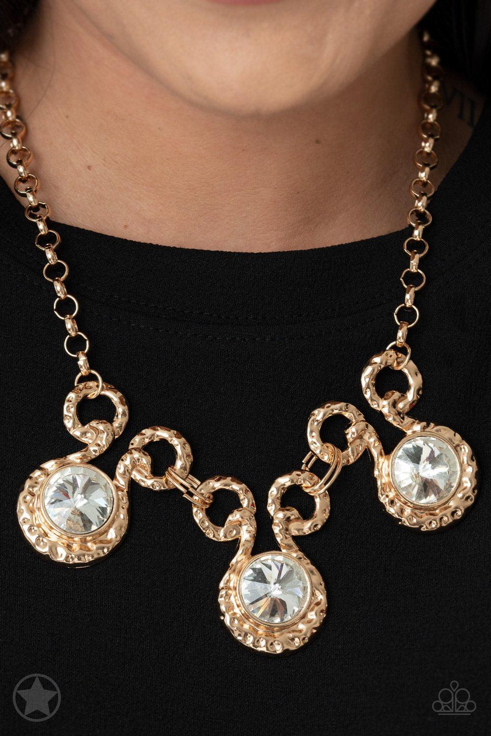 Hypnotized Gold and White Rhinestone Necklace and matching Earrings - Paparazzi Accessories - model -CarasShop.com - $5 Jewelry by Cara Jewels