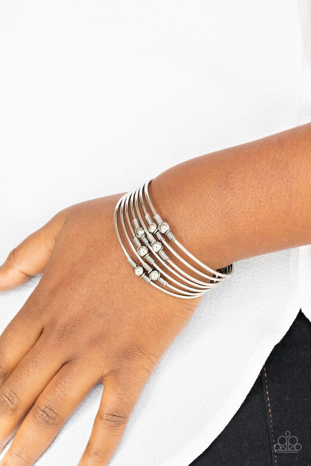 Industrial Intricacies Silver Cuff Bracelet - Paparazzi Accessories- model - CarasShop.com - $5 Jewelry by Cara Jewels