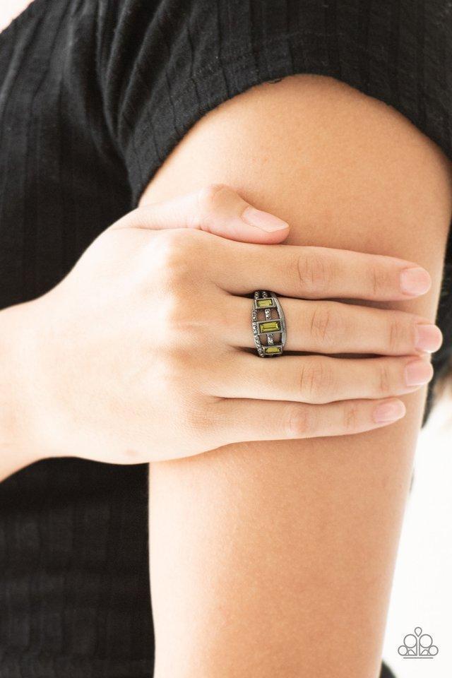 Noble Nova Green Rhinestone and Gunmetal Ring - Paparazzi Accessories- model - CarasShop.com - $5 Jewelry by Cara Jewels