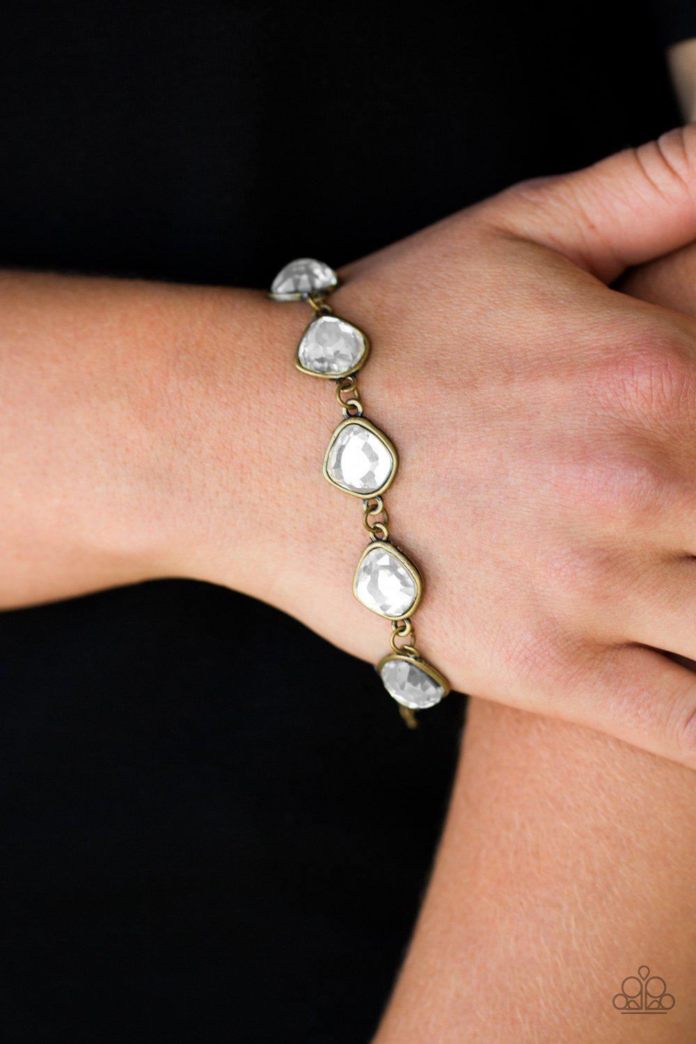 Perfect Imperfection Brass and White Rhinestone Bracelet - Paparazzi Accessories- model - CarasShop.com - $5 Jewelry by Cara Jewels