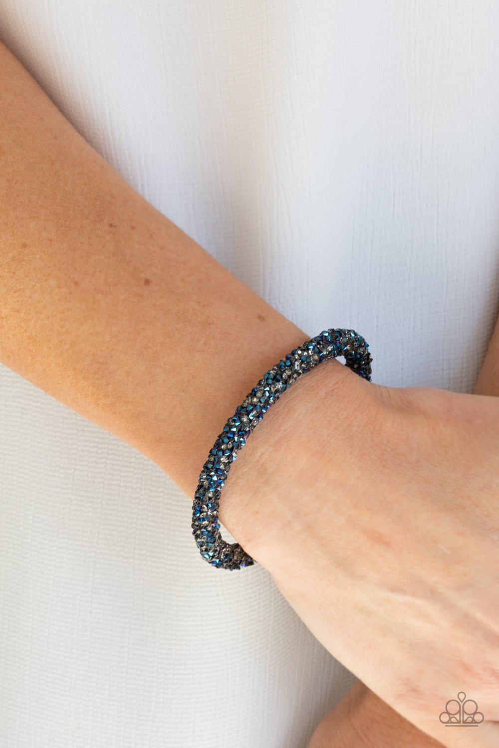 Roll Out The Glitz Multi Metallic Blue and Smoky Rhinestone Coil Bracelet - Paparazzi Accessories- model - CarasShop.com - $5 Jewelry by Cara Jewels