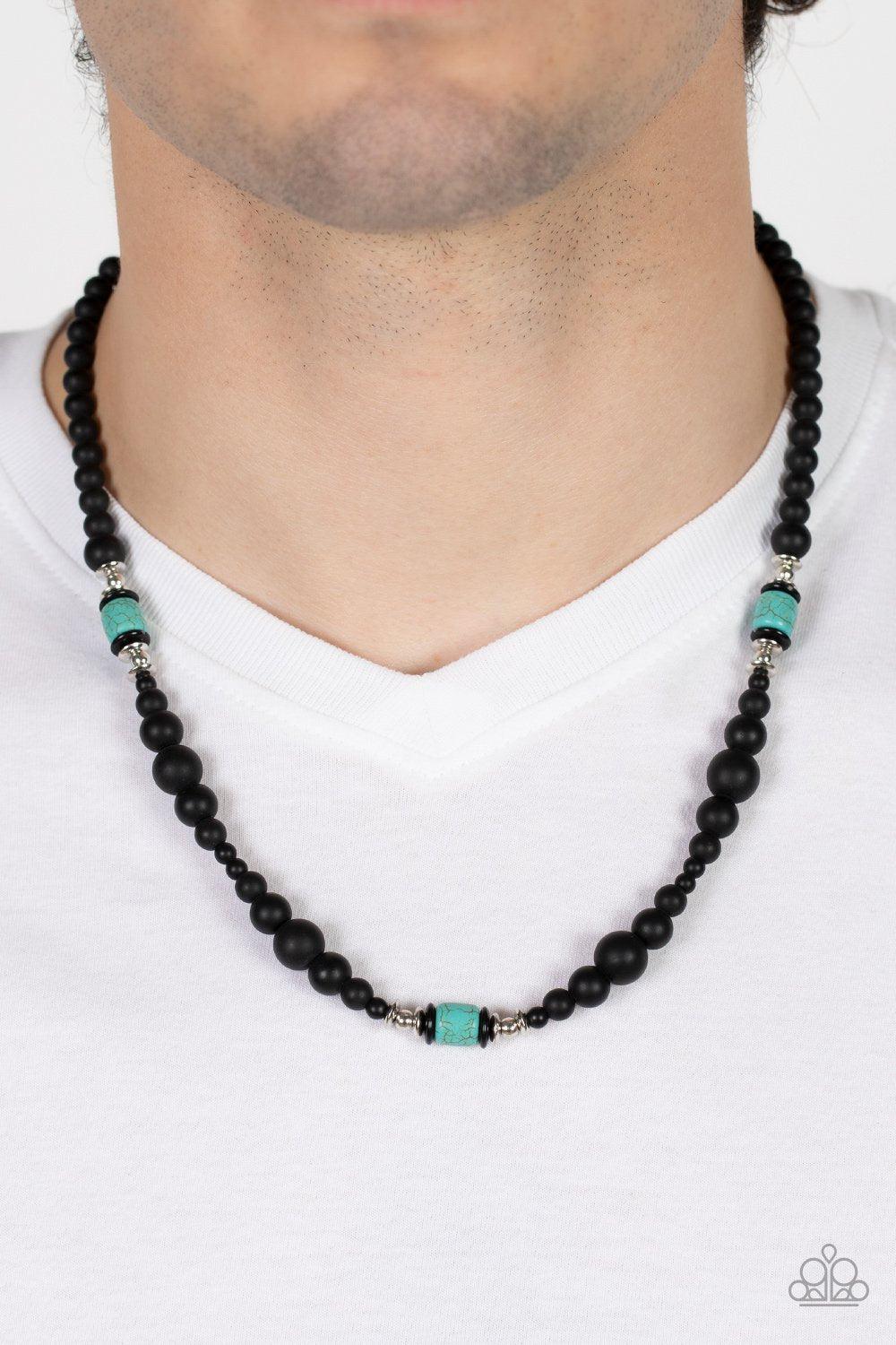 Stone Synchrony Turquoise Blue and Black Stone Urban Necklace - Paparazzi Accessories- model - CarasShop.com - $5 Jewelry by Cara Jewels