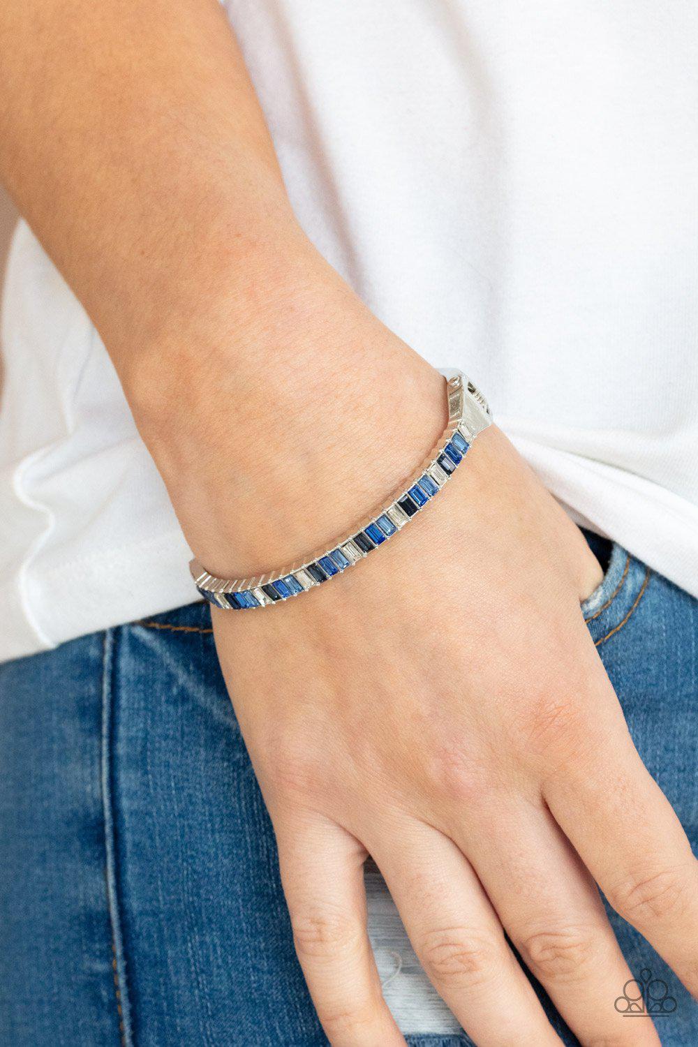 Toast to Twinkle Blue Rhinestone Hinged Bracelet - Paparazzi Accessories- model - CarasShop.com - $5 Jewelry by Cara Jewels