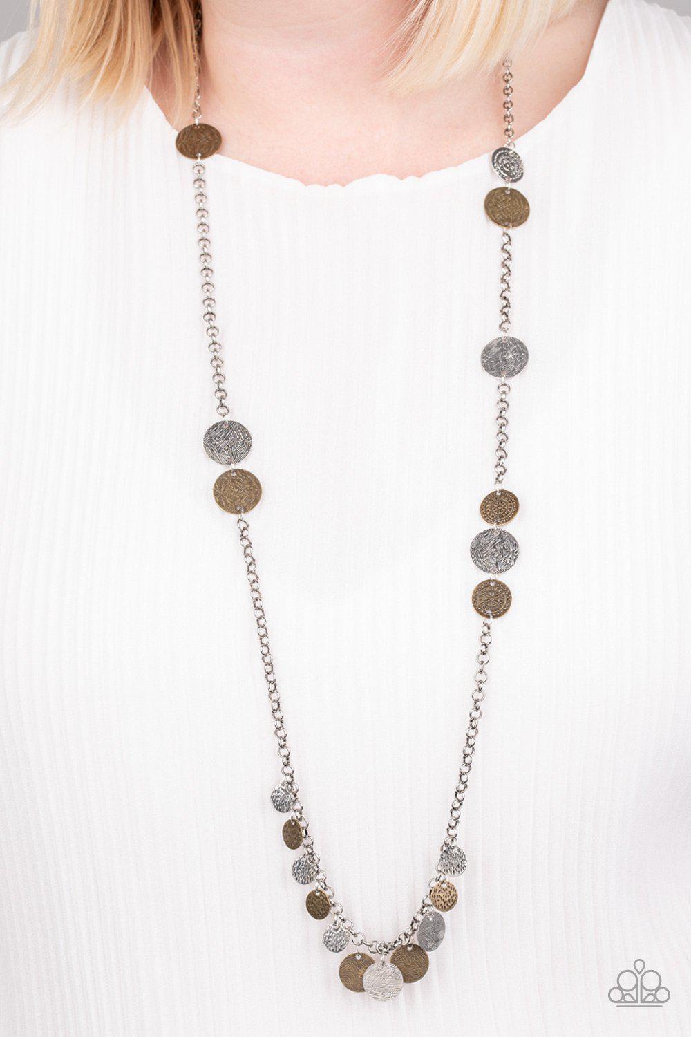 Trailblazing Trinket Multi Silver and Brass Necklace - Paparazzi Accessories - model -CarasShop.com - $5 Jewelry by Cara Jewels