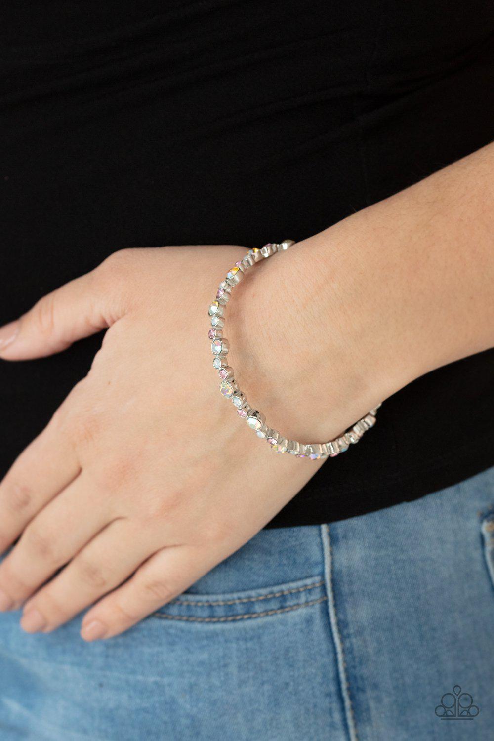 Twinkly Trendsetter Multi Pink, White and Iridescent Rhinestone Bangle Bracelet - Paparazzi Accessories- model - CarasShop.com - $5 Jewelry by Cara Jewels