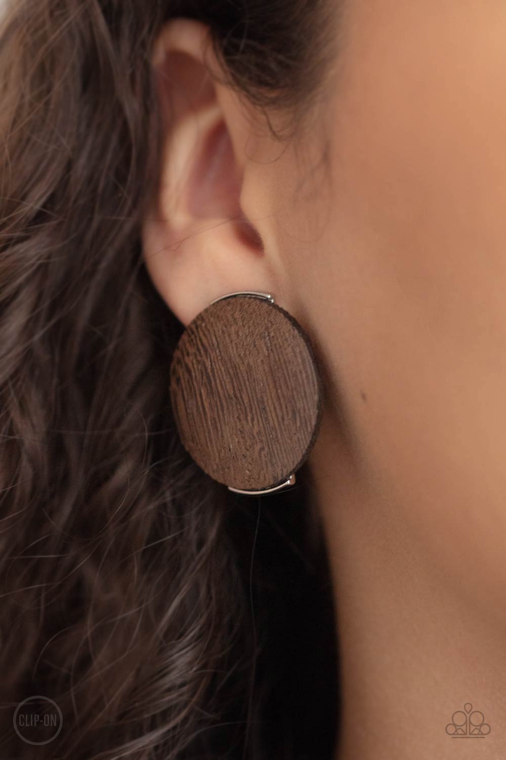 WOODWORK It Brown Wood Clip-on Earrings - Paparazzi Accessories- model - CarasShop.com - $5 Jewelry by Cara Jewels