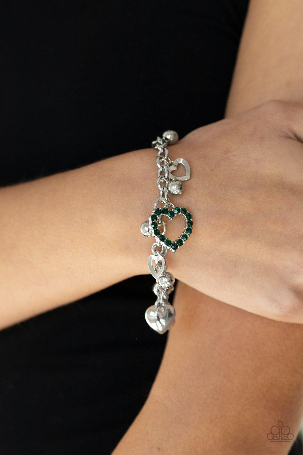 Beautifully Big-Hearted Green Rhinestone and Silver Heart Charm Bracelet - Paparazzi Accessories - model -CarasShop.com - $5 Jewelry by Cara Jewels
