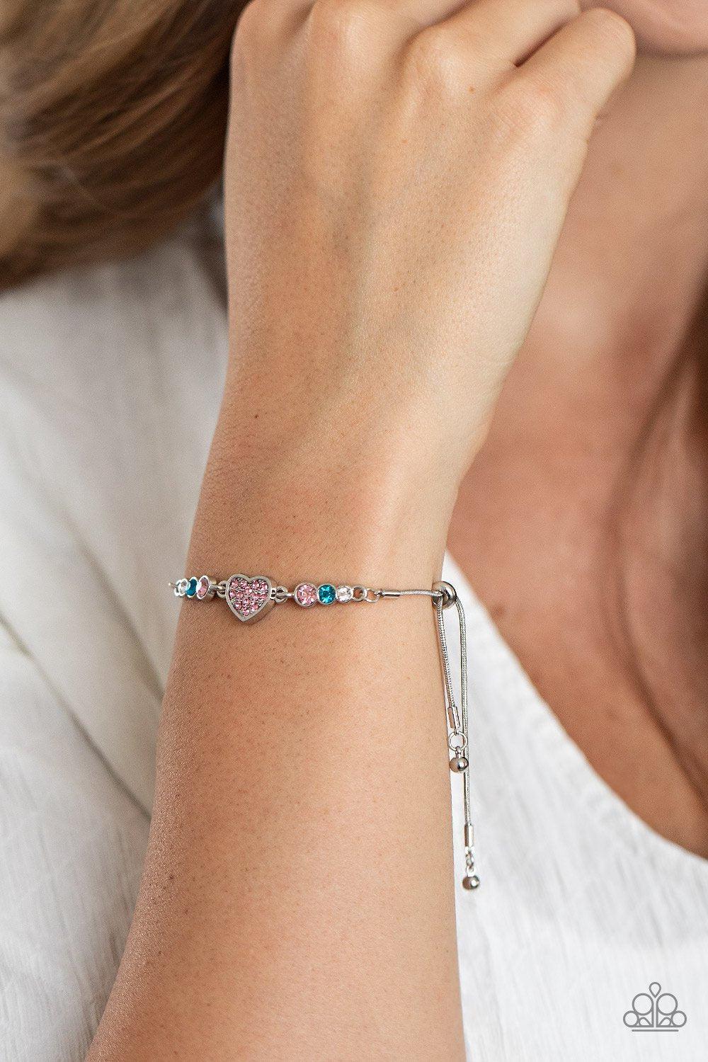 Big-Hearted Beam Multi Blue and Pink Rhinestone Heart Slide Bracelet - Paparazzi Accessories - model -CarasShop.com - $5 Jewelry by Cara Jewels