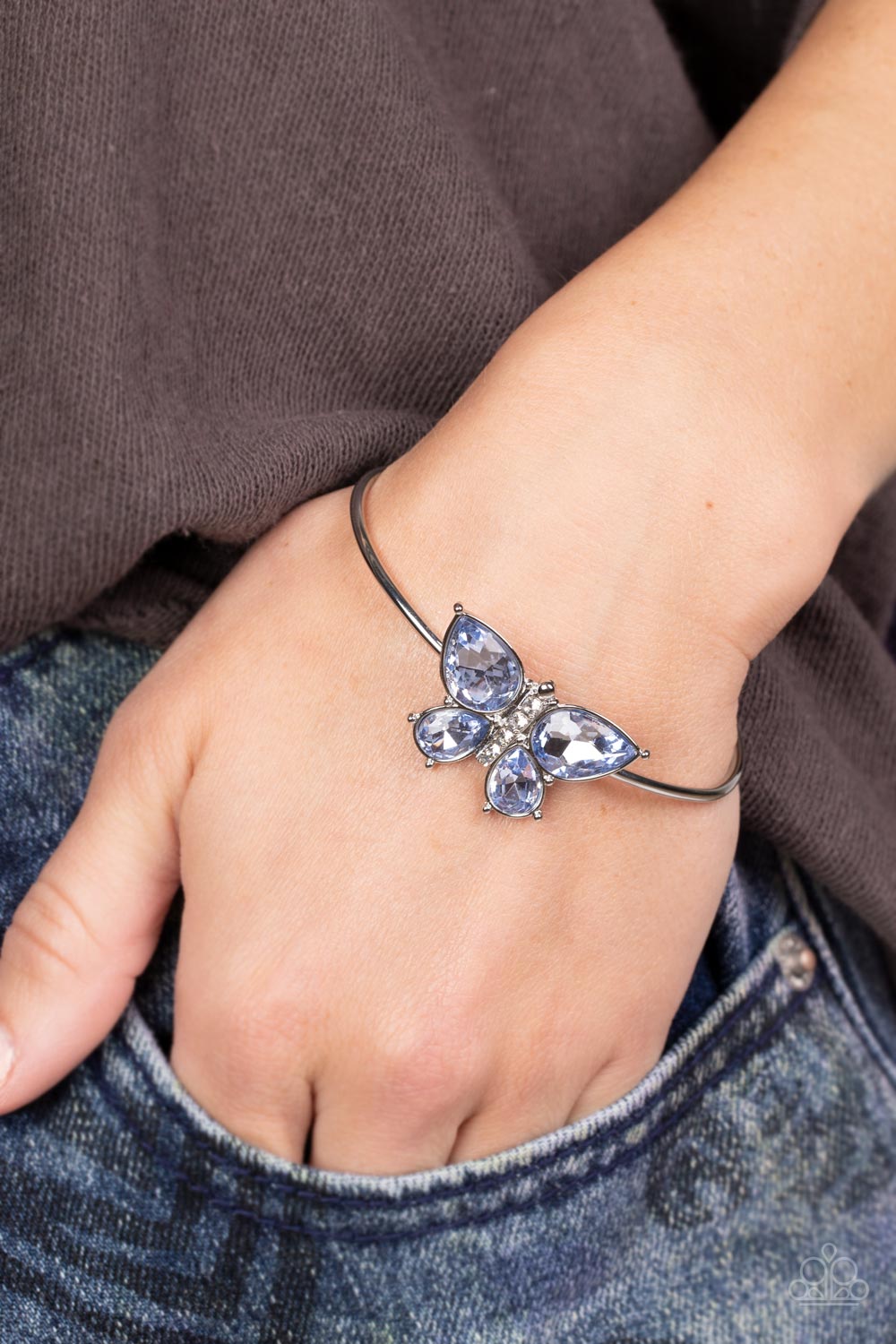 Butterfly Beatitude Blue Rhinestone Butterfly Cuff Bracelet - Paparazzi Accessories-on model - CarasShop.com - $5 Jewelry by Cara Jewels