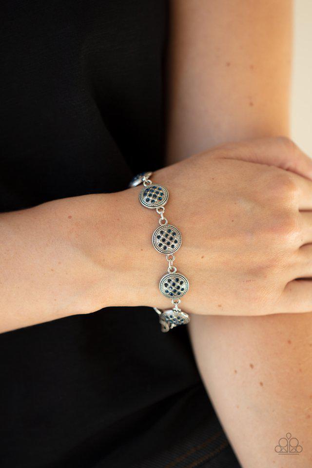 By Royal Decree Blue Rhinestone Bracelet - Paparazzi Accessories- on model - CarasShop.com - $5 Jewelry by Cara Jewels