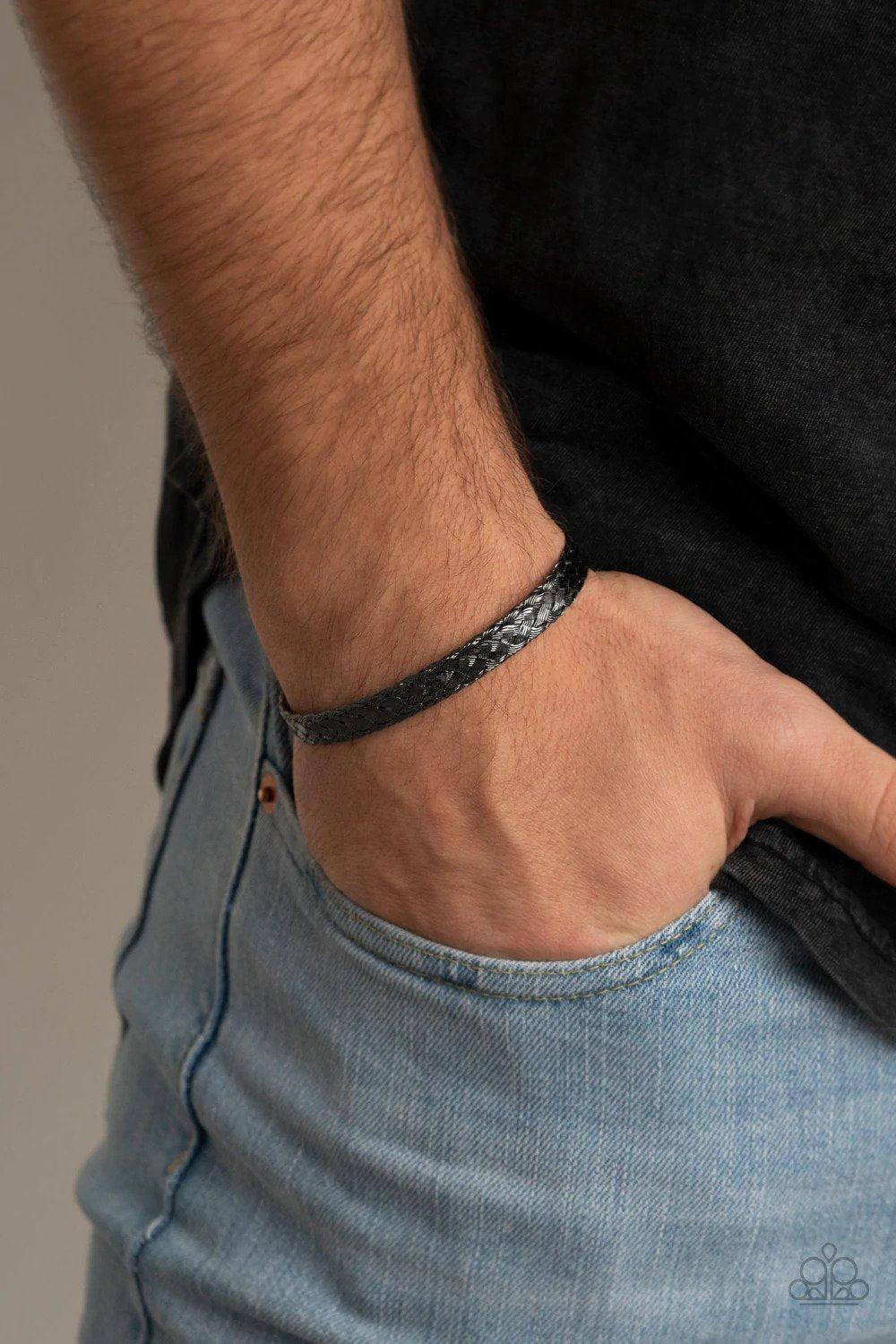Cable Couture Men&#39;s Black Cuff Bracelet - Paparazzi Accessories- on model - CarasShop.com - $5 Jewelry by Cara Jewels