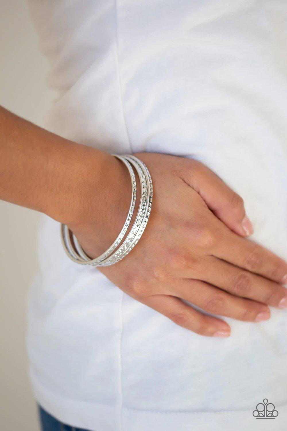 Casually Couture Silver Bangle Bracelet - Paparazzi Accessories- on model - CarasShop.com - $5 Jewelry by Cara Jewels