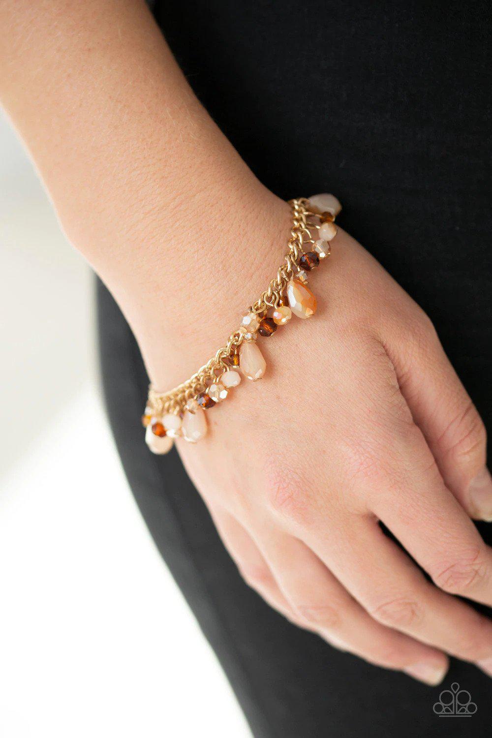 Catwalk Crawl Gold Bracelet - Paparazzi Accessories- on model - CarasShop.com - $5 Jewelry by Cara Jewels
