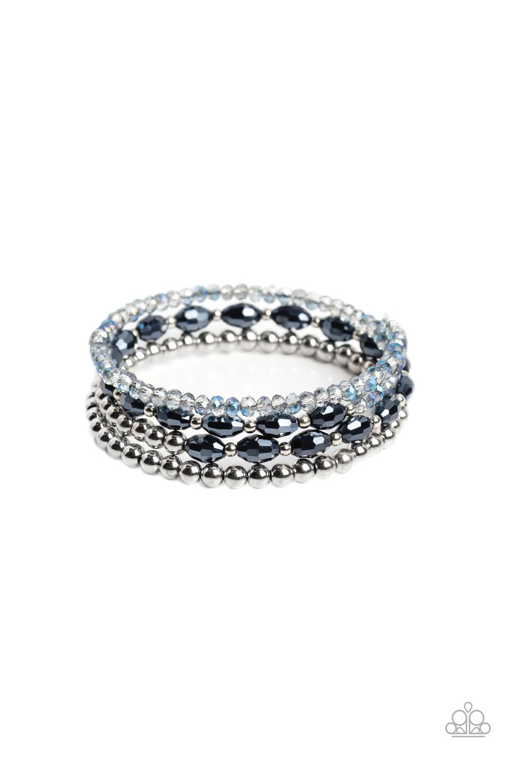 Celestial Chapter Blue Coil Bracelet - Paparazzi Accessories- lightbox - CarasShop.com - $5 Jewelry by Cara Jewels