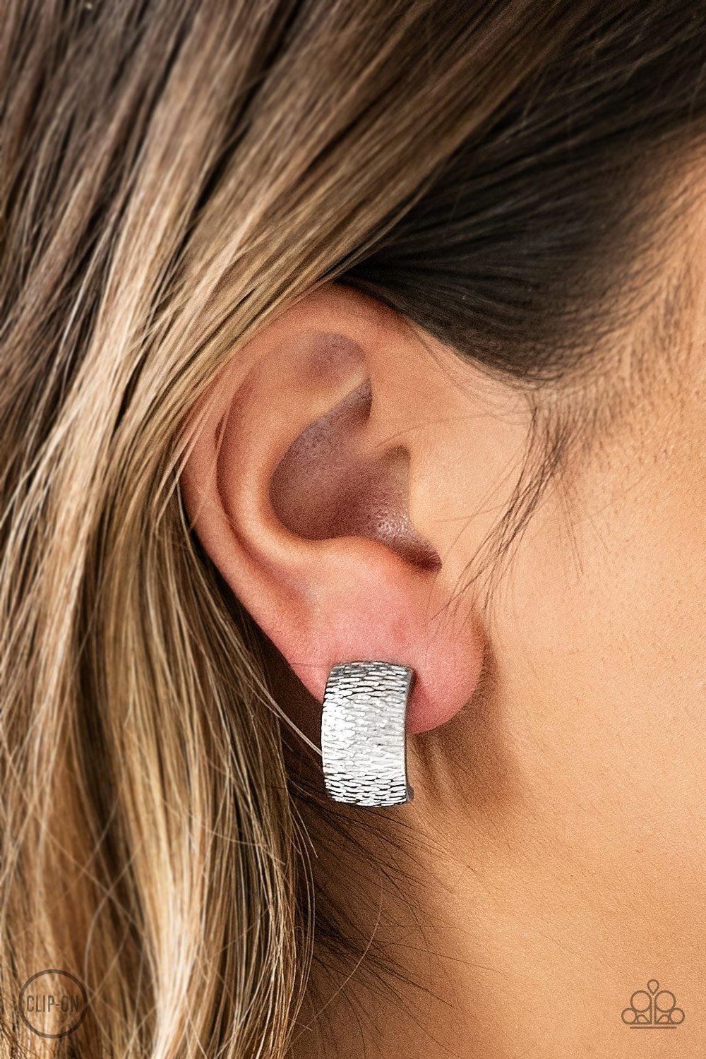 Cirque Du Couture Silver Clip On Earrings - Paparazzi Accessories - model -CarasShop.com - $5 Jewelry by Cara Jewels