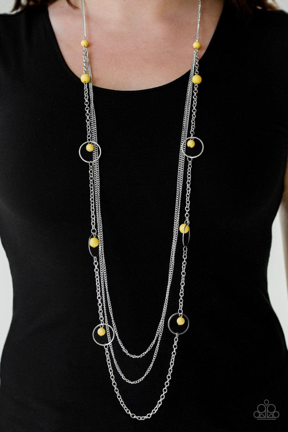Collectively Carefree Silver and Yellow Necklace - Paparazzi Accessories-CarasShop.com - $5 Jewelry by Cara Jewels
