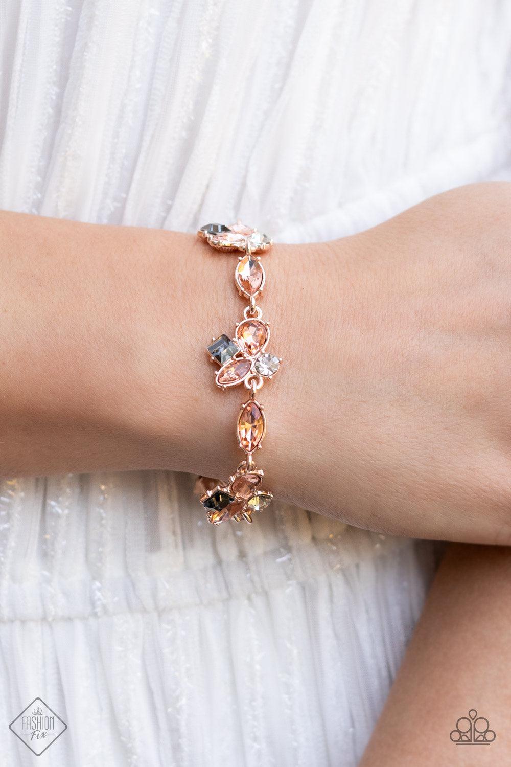 Colorful Captivation Rose Gold &amp; Smoky Rhinestone Bracelet - Paparazzi Accessories-on model - CarasShop.com - $5 Jewelry by Cara Jewels