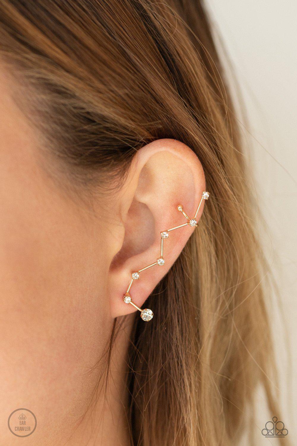 CONSTELLATION Prize Gold and White Rhinestone Ear Crawler Earrings - Paparazzi Accessories - model -CarasShop.com - $5 Jewelry by Cara Jewels