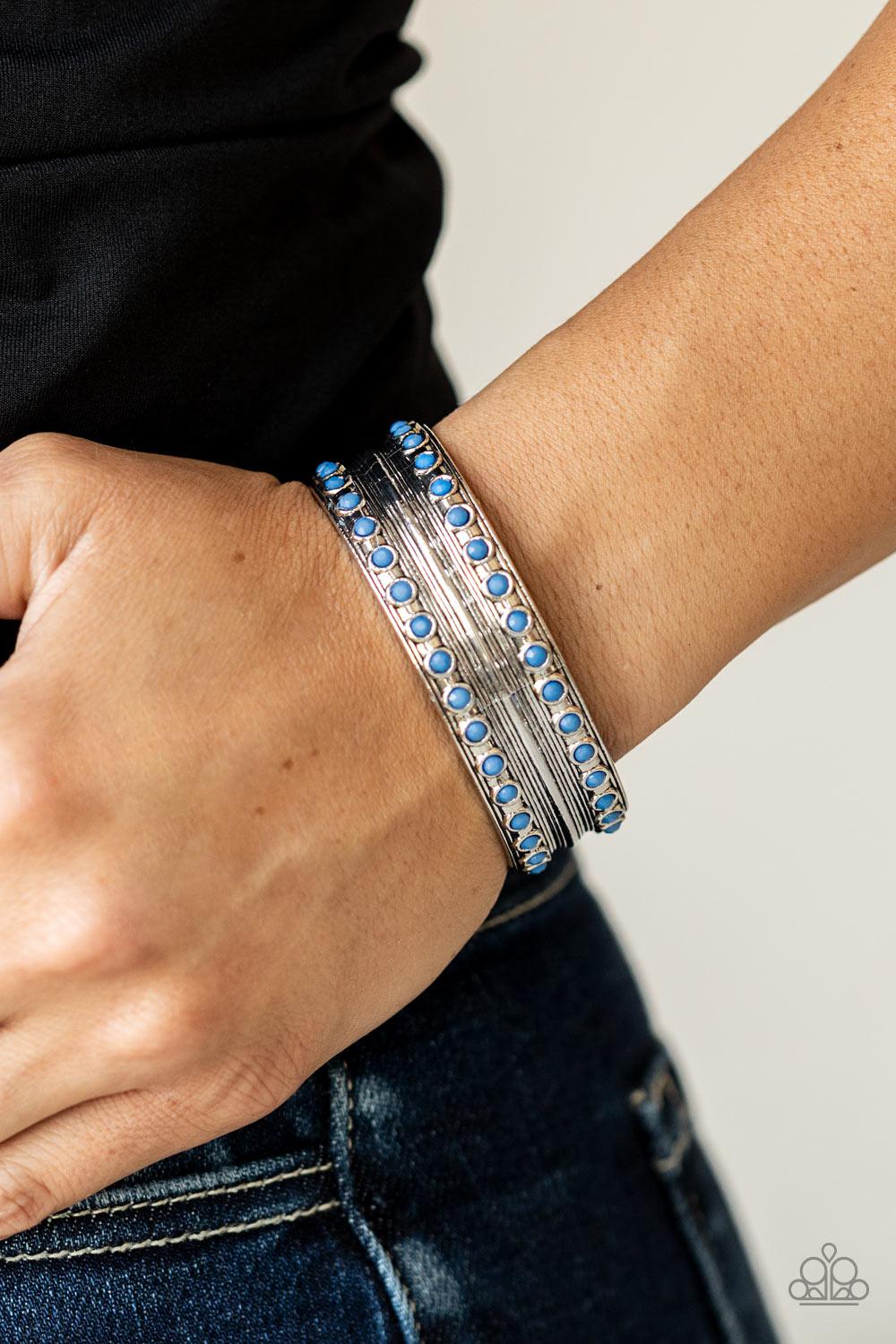 Costa Rica Retreat Blue &amp; Silver Cuff Bracelet - Paparazzi Accessories- on model - CarasShop.com - $5 Jewelry by Cara Jewels