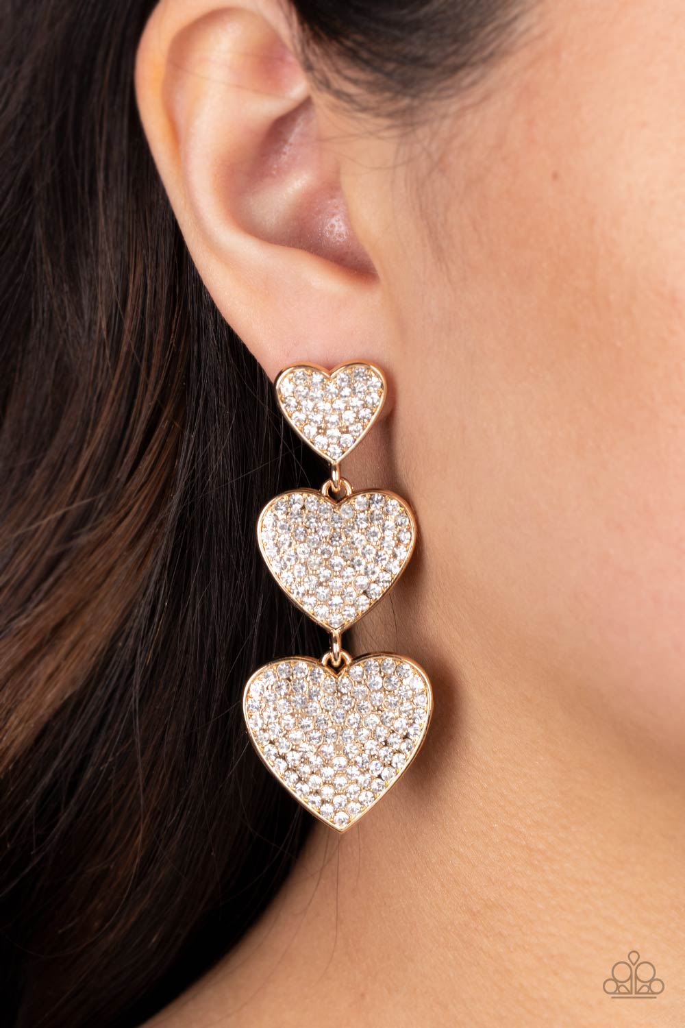 Couples Retreat Gold &amp; White Rhinestone Heart Earrings - Paparazzi Accessories-on model - CarasShop.com - $5 Jewelry by Cara Jewels
