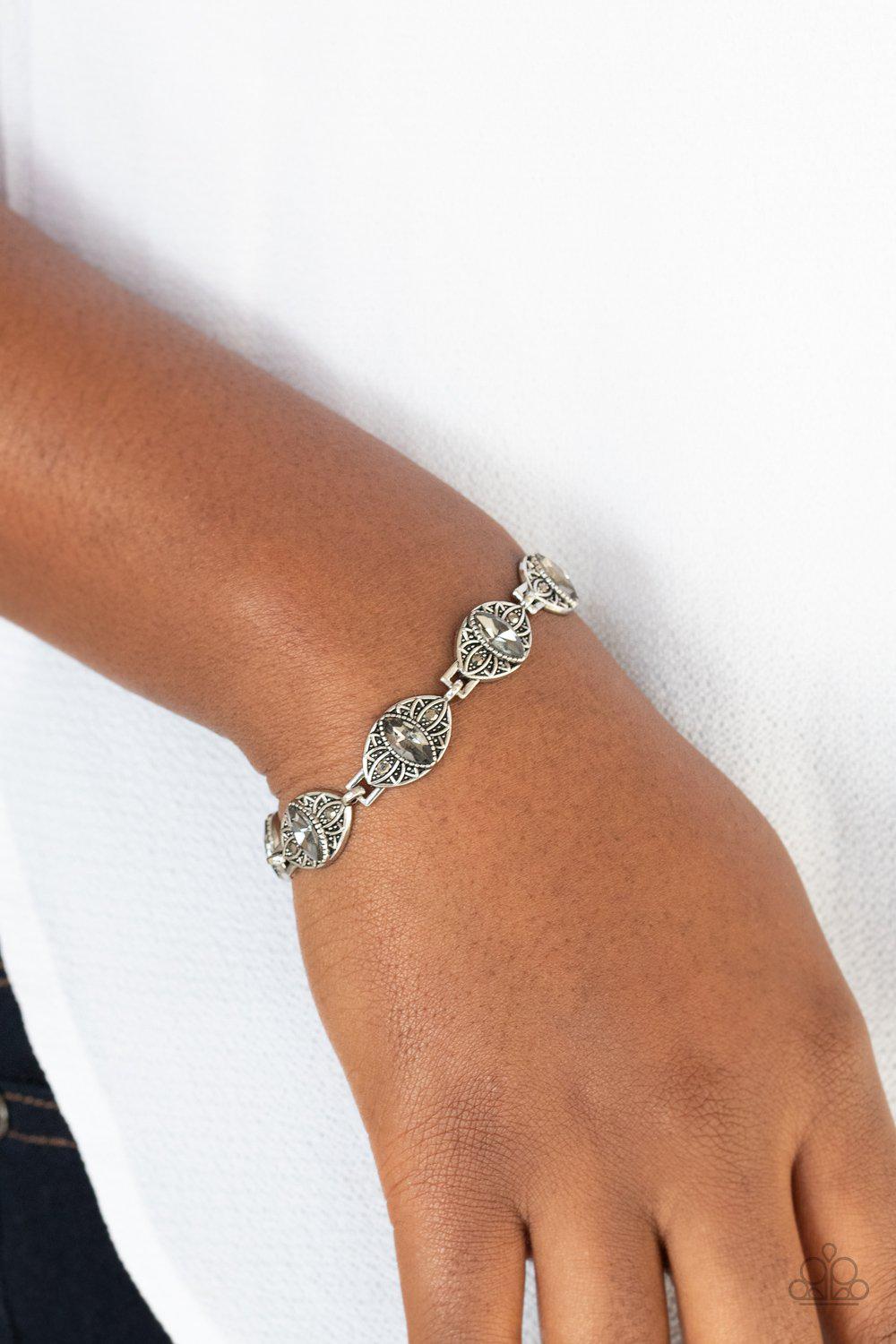 Crown Privilege Silver and Hematite Rhinestone Bracelet - Paparazzi Accessories- model - CarasShop.com - $5 Jewelry by Cara Jewels