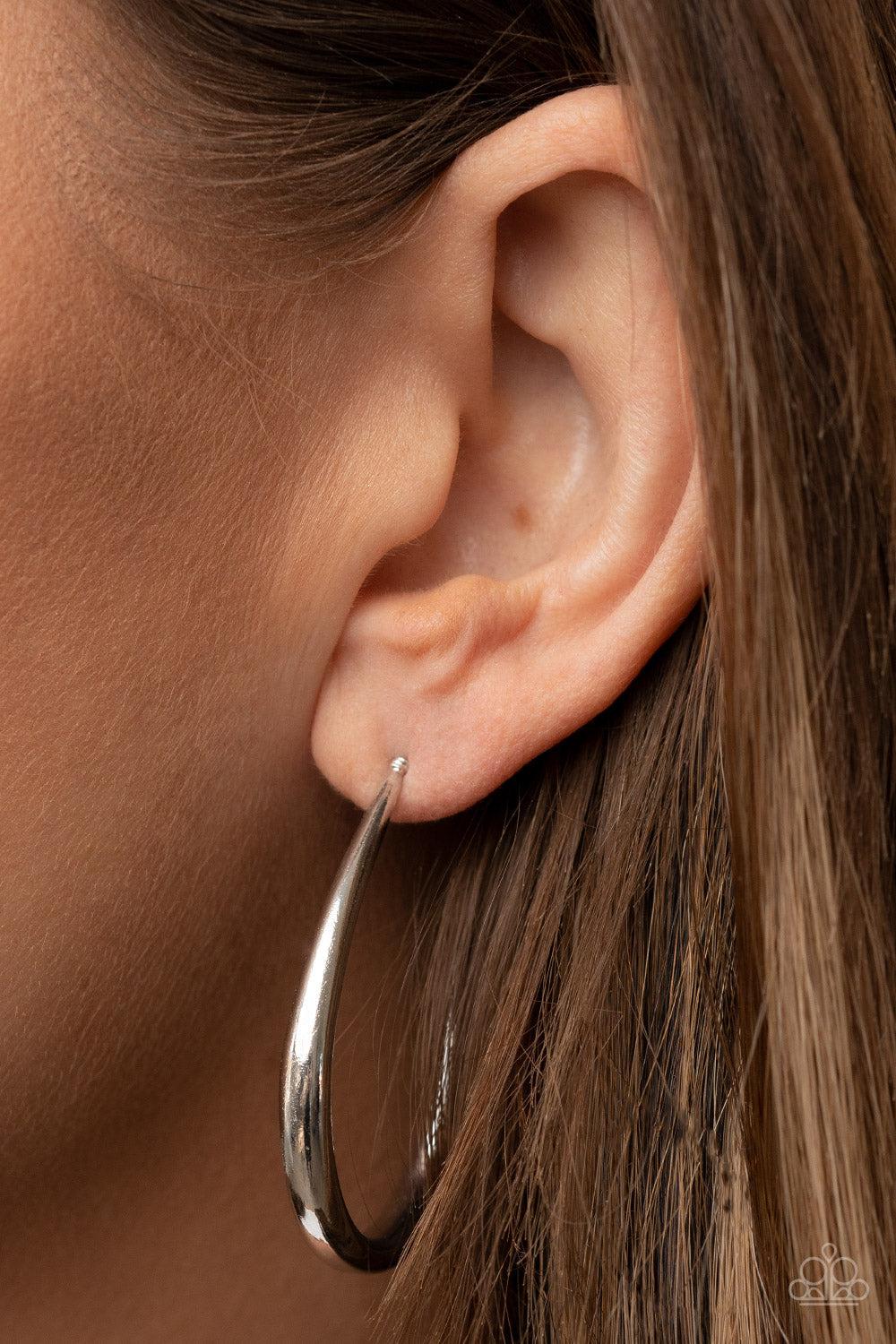 CURVE Your Appetite Silver Hoop Earrings - Paparazzi Accessories-on model - CarasShop.com - $5 Jewelry by Cara Jewels