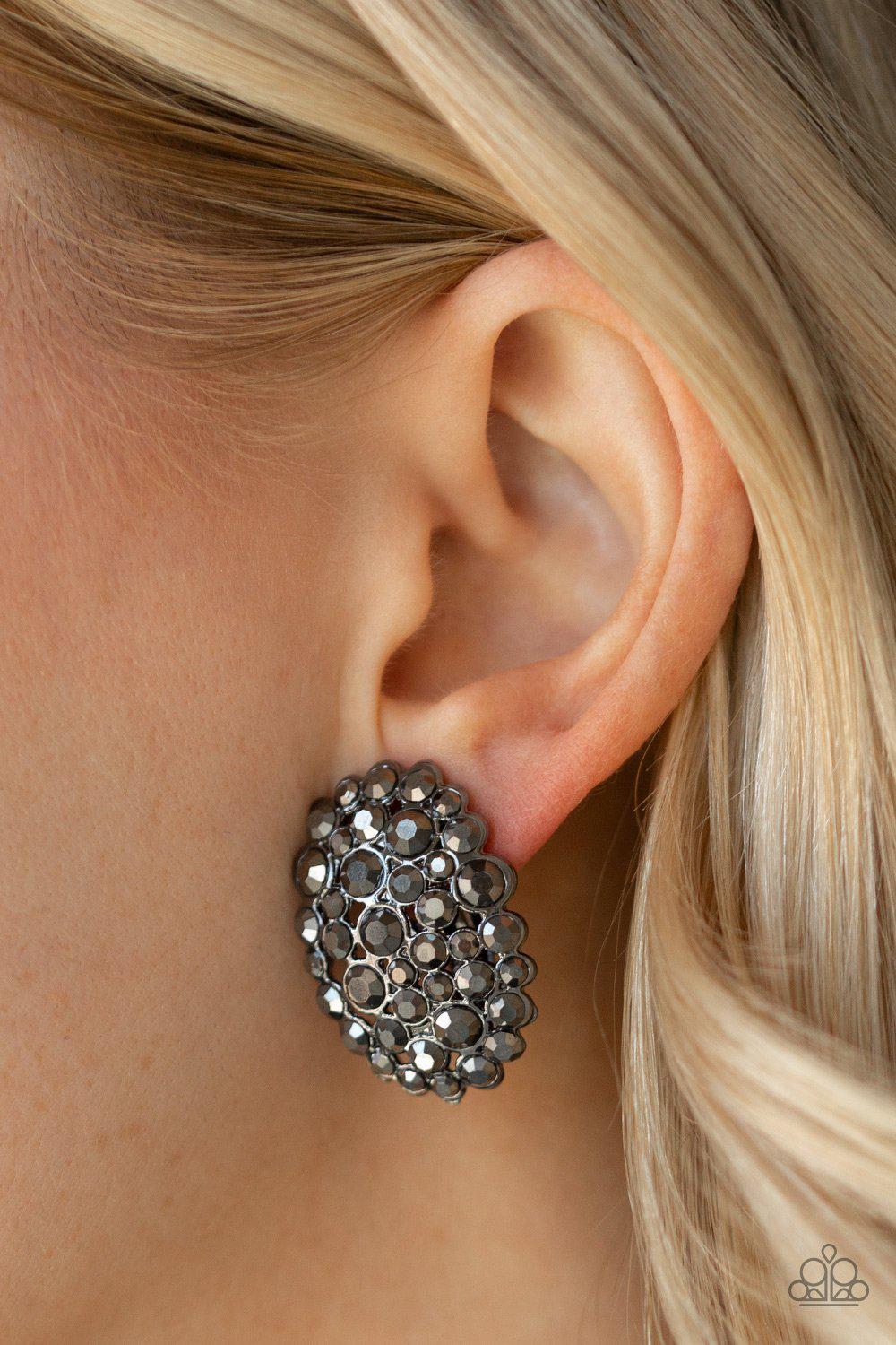 Daring Dazzle Gunmetal Black Clip On Earrings - Paparazzi Accessories - model -CarasShop.com - $5 Jewelry by Cara Jewels