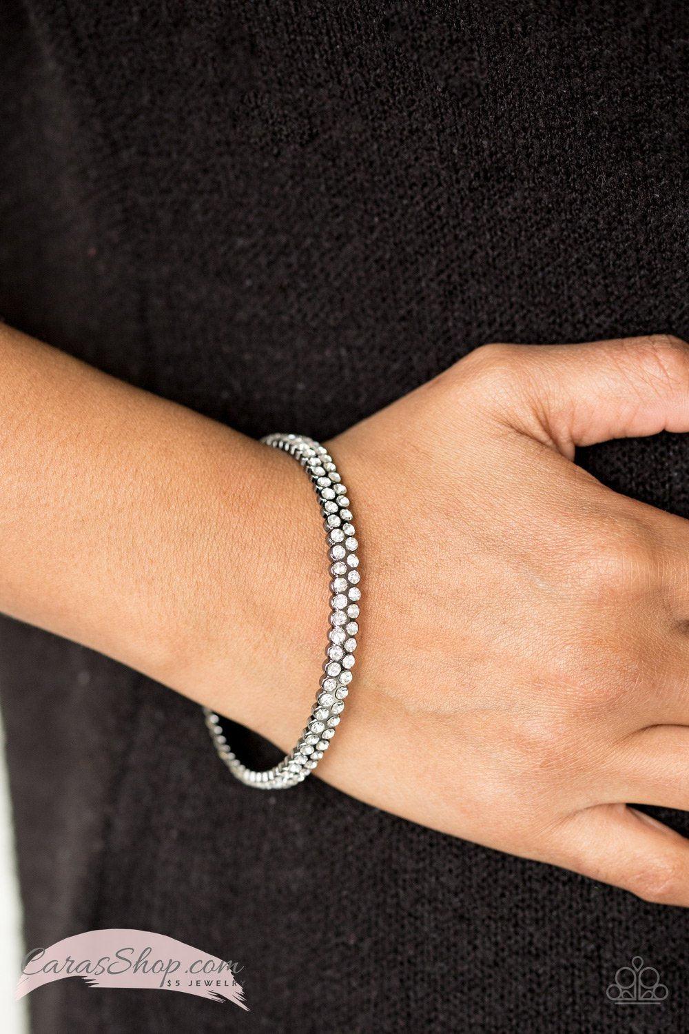 Decked Out In Diamonds Gunmetal and White Rhinestone Bangle Bracelet - Paparazzi Accessories- on model - CarasShop.com - Paparazzi Jewelry by Cara Jewels